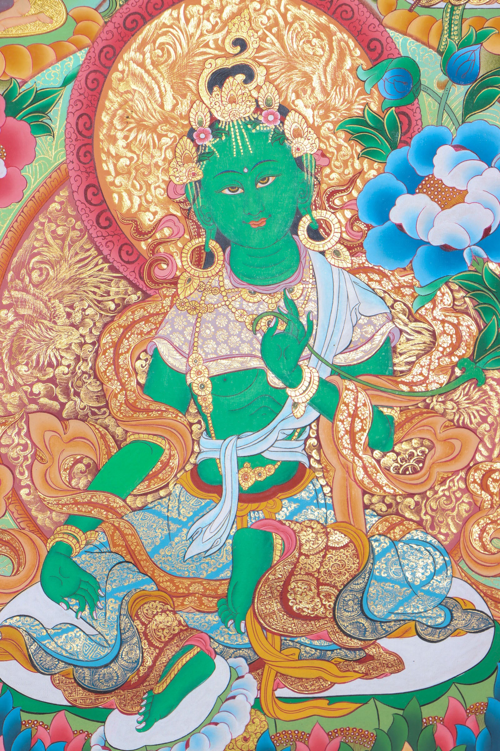 This 21 Tara Thangka is a genuine hand-painted masterpiece that honors the 21 forms of Tara, the compassionate female Bodhisattva known for protection and swift assistance. Rich in spiritual symbolism and crafted with traditional pigments, it serves as a powerful aid for meditation, mantra recitation, and deep devotional practice.