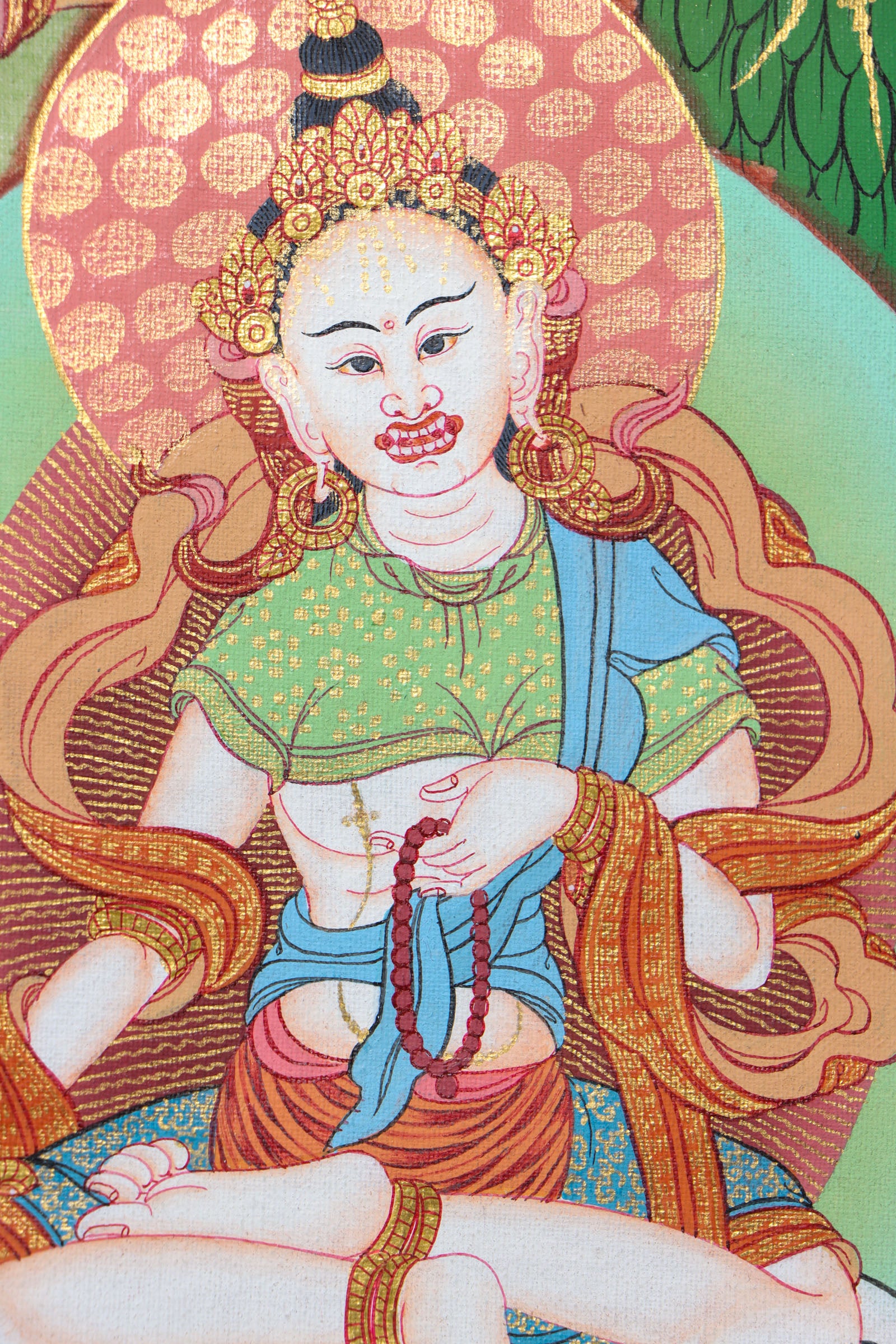 This 21 Tara Thangka is a genuine hand-painted masterpiece that honors the 21 forms of Tara, the compassionate female Bodhisattva known for protection and swift assistance. Rich in spiritual symbolism and crafted with traditional pigments, it serves as a powerful aid for meditation, mantra recitation, and deep devotional practice.