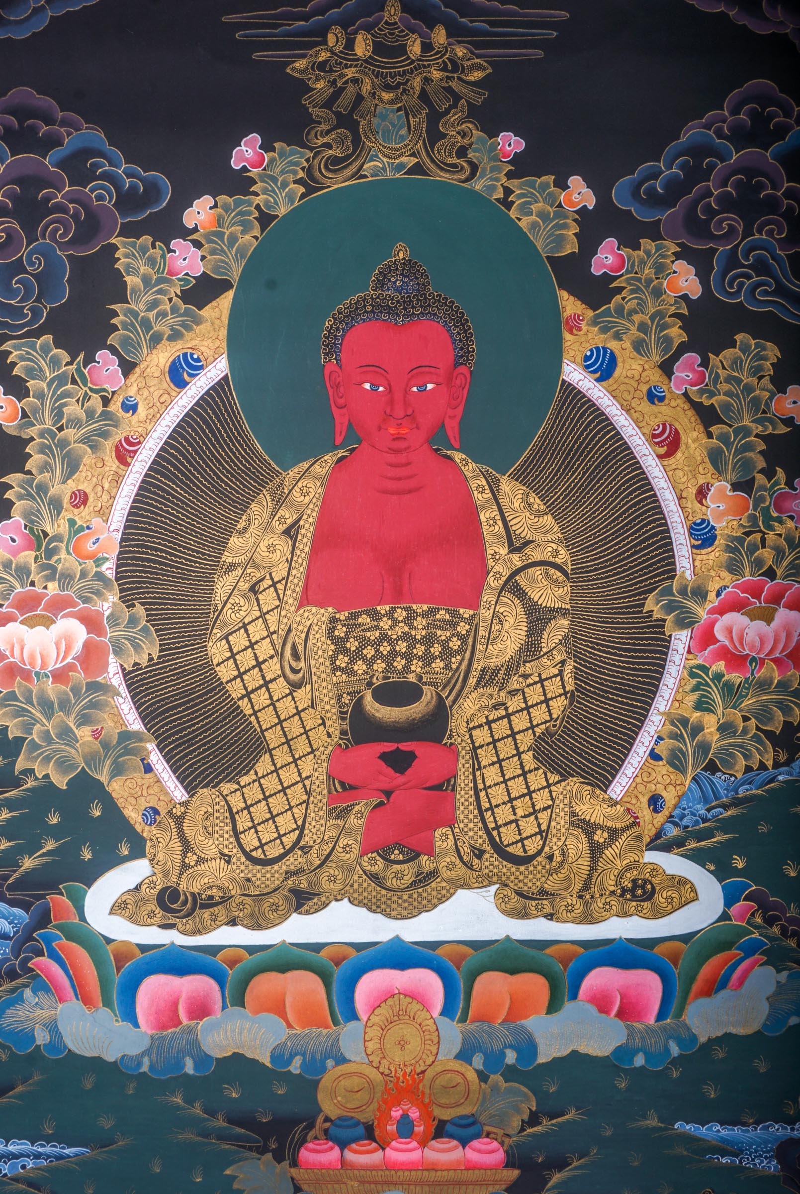 This genuine Tibetan Thangka of Amitabha Buddha beautifully captures his essence as the Buddha of Infinite Light and Life, central to Pure Land Buddhism. Hand-painted with mineral pigments, it brings peace, compassion, and enlightenment into any sacred space.