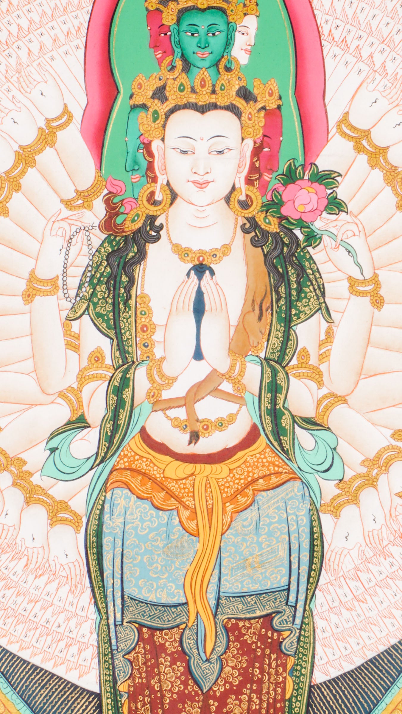 Exquisite Tibetan Thangka painting of Avalokiteshvara (Guanyin), the Bodhisattva of Compassion, hand-painted with natural pigments. A sacred Buddhist artwork for meditation, altars, or spiritual decor, symbolizing peace and enlightenment.