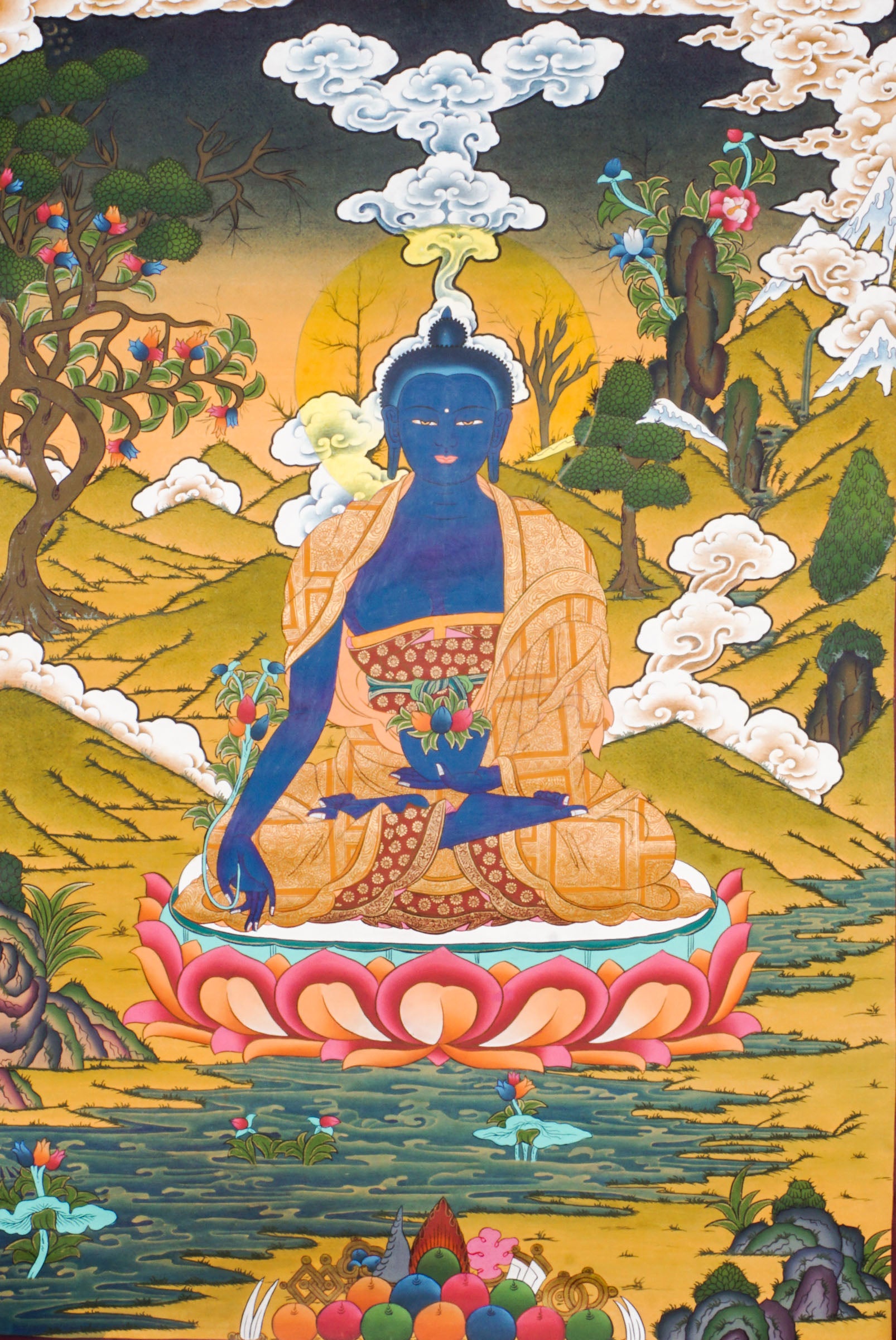 Medicine Buddha Thangka is a genuine Tibetan Buddhist painting that represents healing, balance, and spiritual protection. Painted in deep lapis blue, the Medicine Buddha holds the arura plant and a nectar bowl, symbolizing the power to heal illness and purify negative energy.