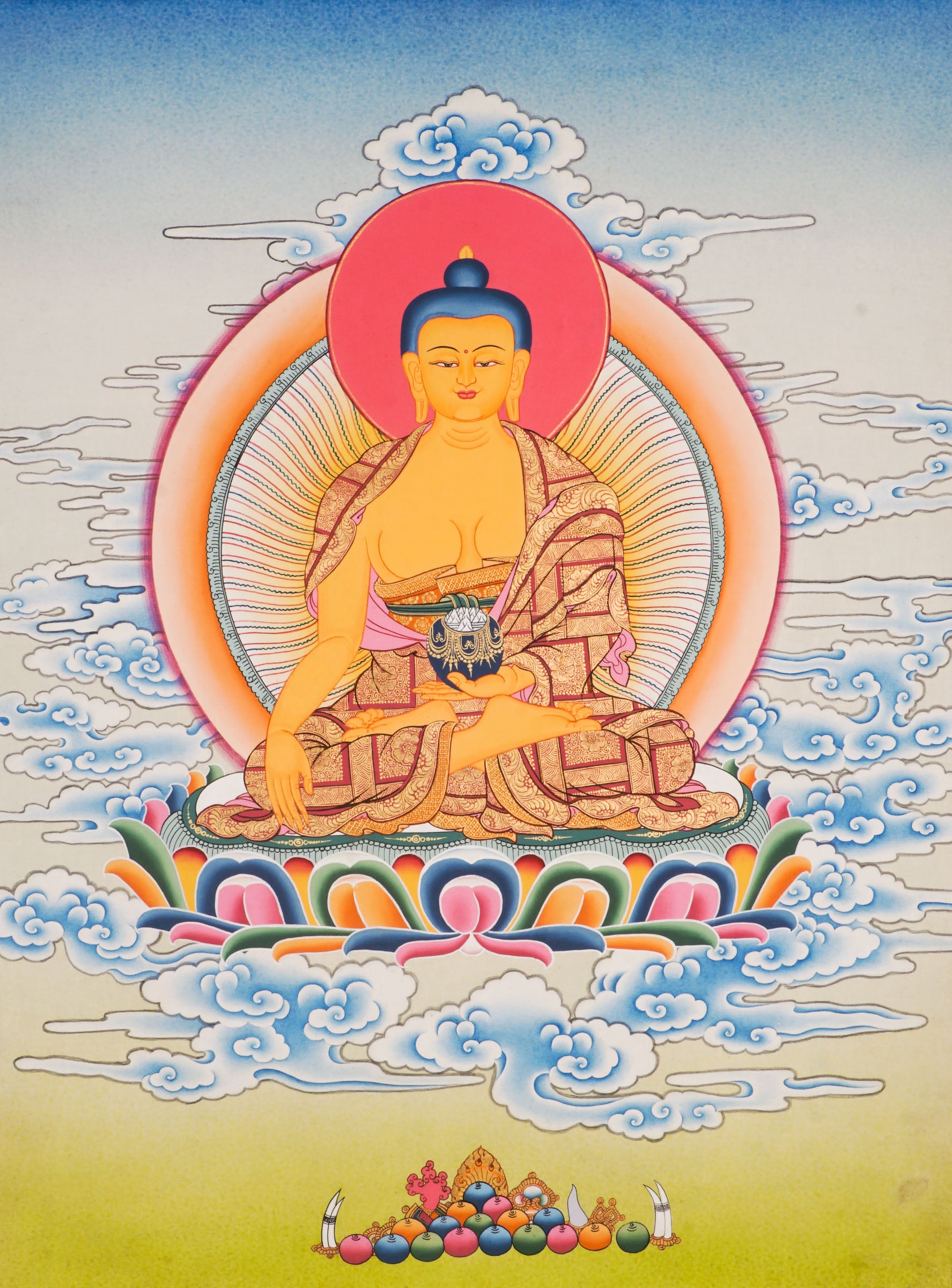 Using traditional techniques this hand-painted Shakyamuni Buddha Thangka is created by skilled Nepali artisans using 24k gold and natural pigments.