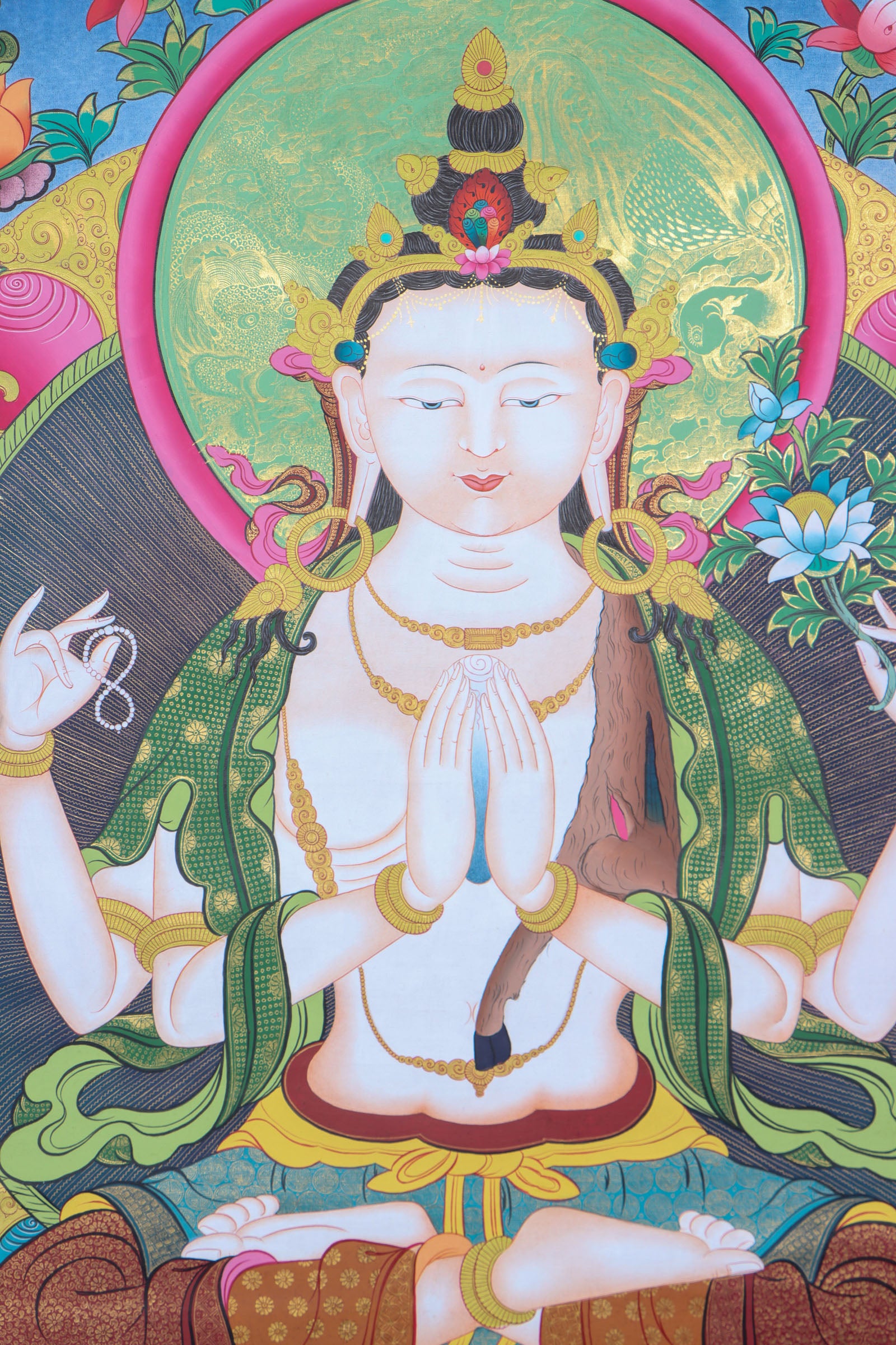 Chengresi, also known as Chenrezig or Avalokiteshvara, is the Tibetan Buddhist deity of compassion, revered for his ability to ease suffering and inspire empathy. This hand-painted Thangka captures his sacred essence with vibrant natural pigments on cotton canvas, blending spiritual depth with masterful Tibetan craftsmanship.