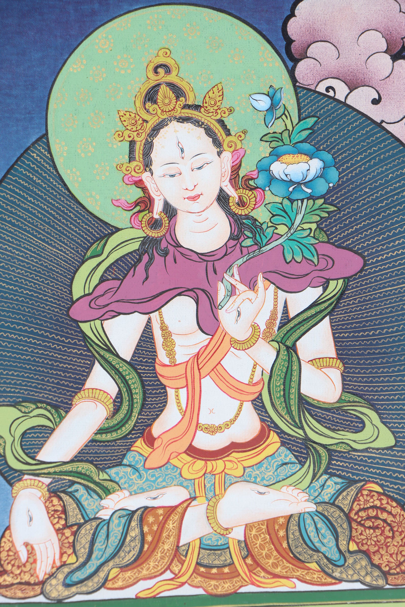 Chengresi, also known as Chenrezig or Avalokiteshvara, is the Tibetan Buddhist deity of compassion, revered for his ability to ease suffering and inspire empathy. This hand-painted Thangka captures his sacred essence with vibrant natural pigments on cotton canvas, blending spiritual depth with masterful Tibetan craftsmanship.