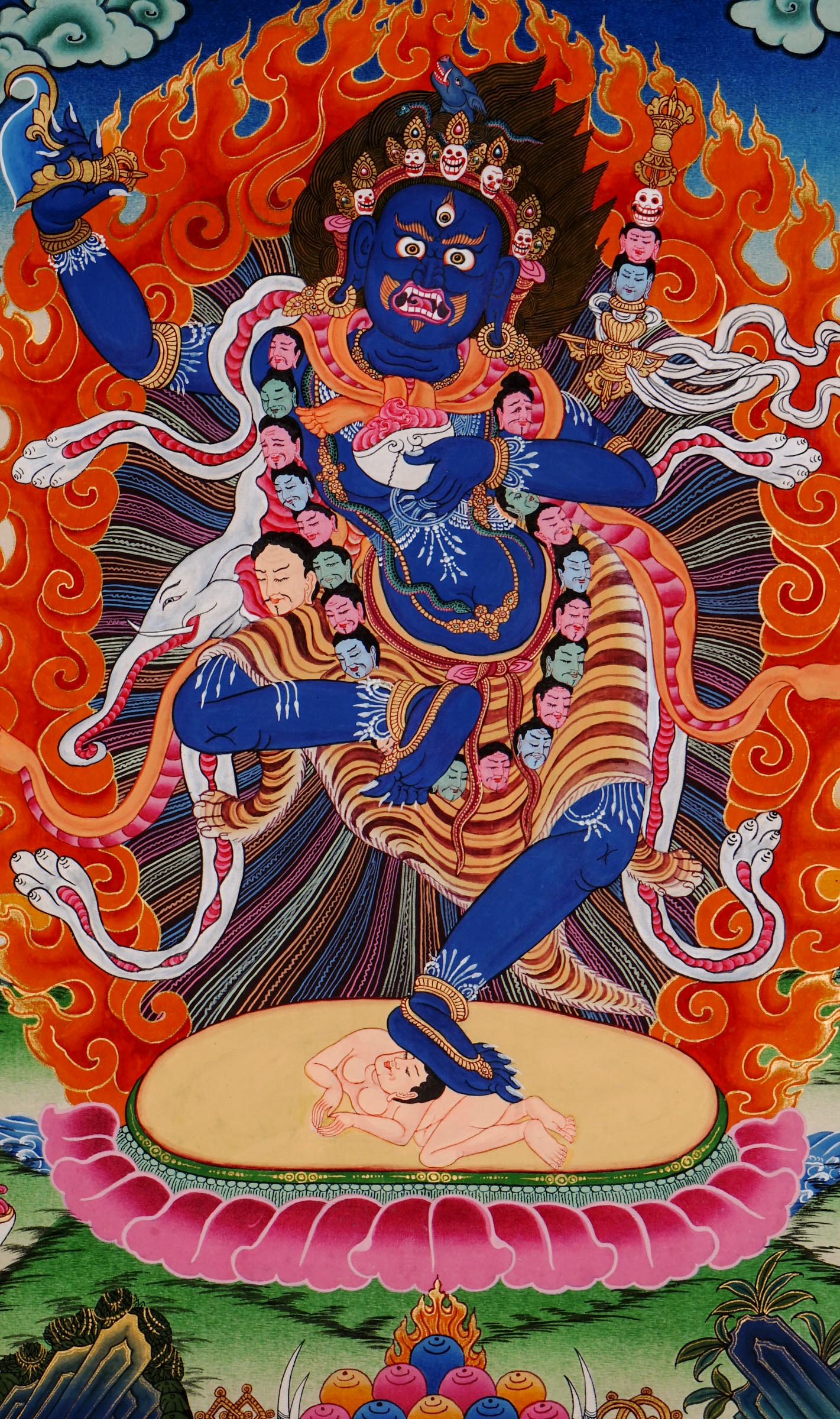 Wrathful wisdom dakini with boar’s head, holding vajra and skull cup, dancing in flames on a subdued figure, hand-painted with natural pigments and gold on cotton canvas in Nepal.