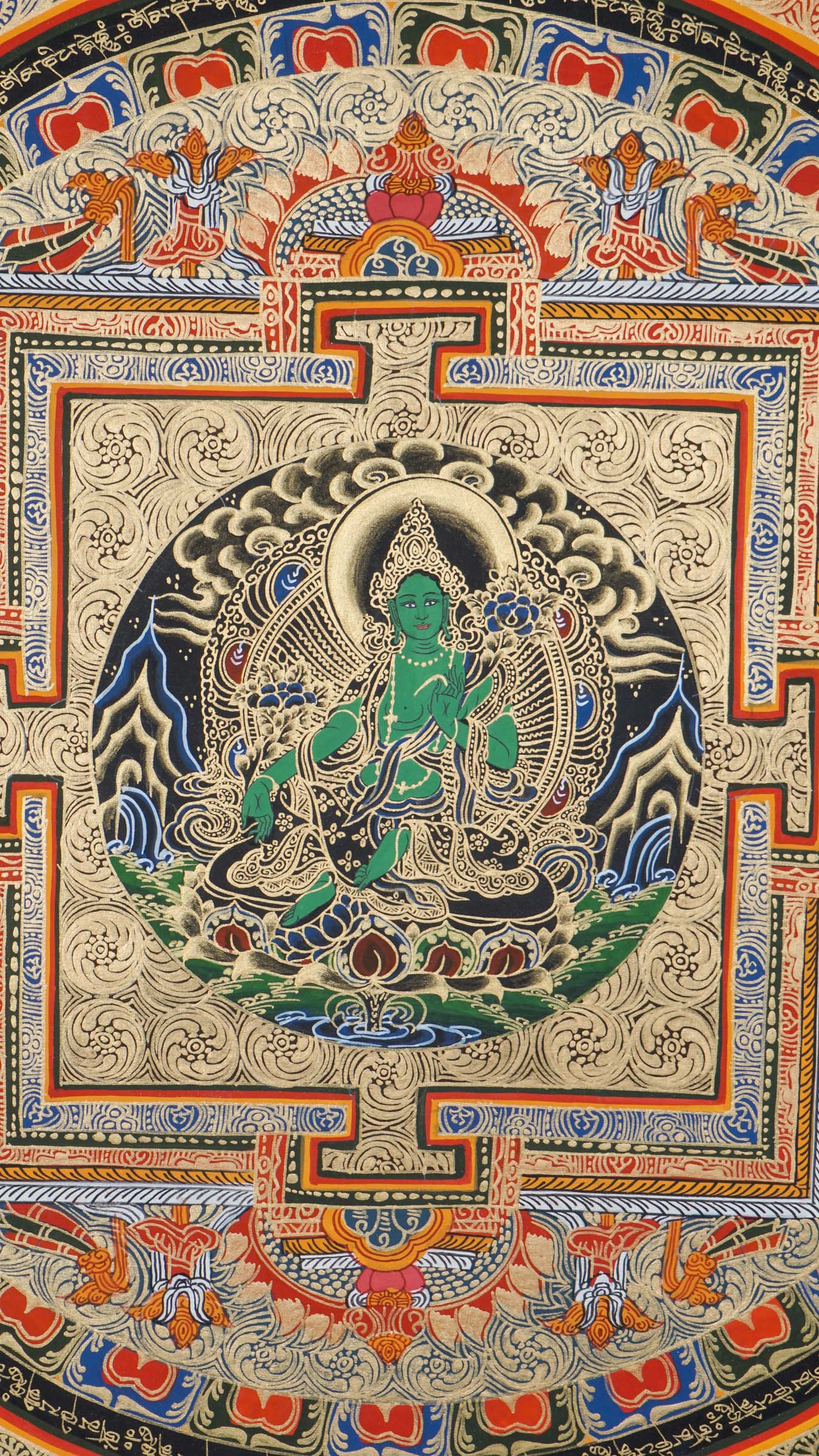 A circular mandala showcasing Green Tara at the center, hand painted in Nepal by skilled artisans.