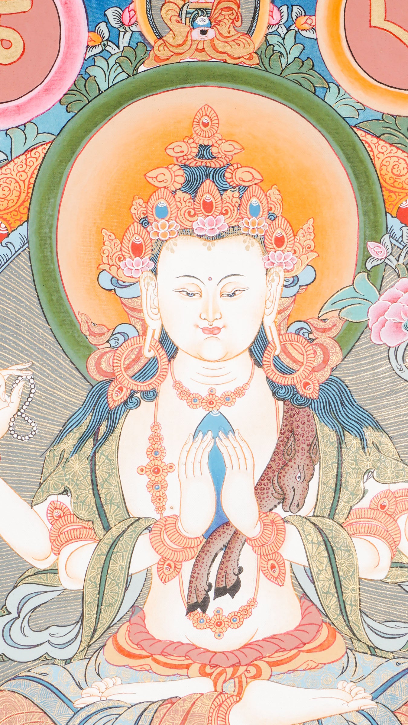 Hand-painted Chengresi Thangka showing the Bodhisattva of Compassion with a sacred mantra circle, crafted with 24k gold and natural pigments.