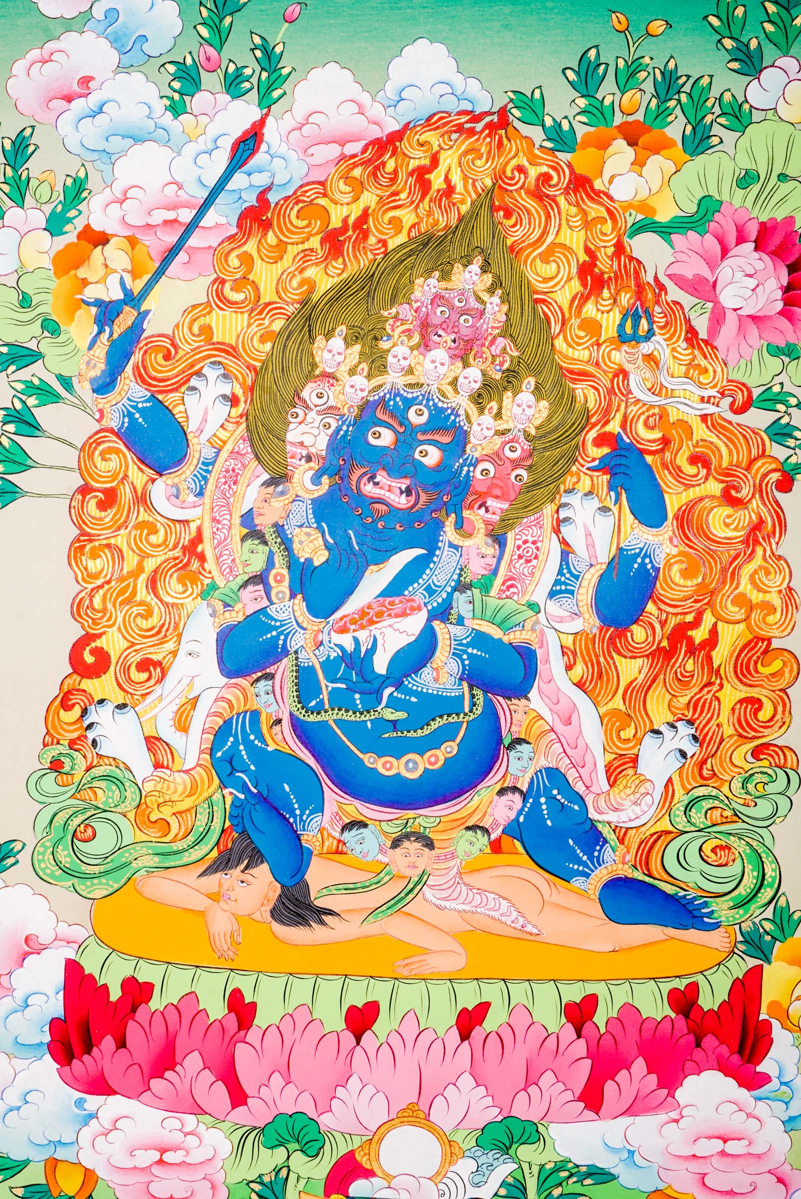 A sacred hand-painted Thangka Art using 24k gold and natural pigments of Mahakala, the fierce protector.