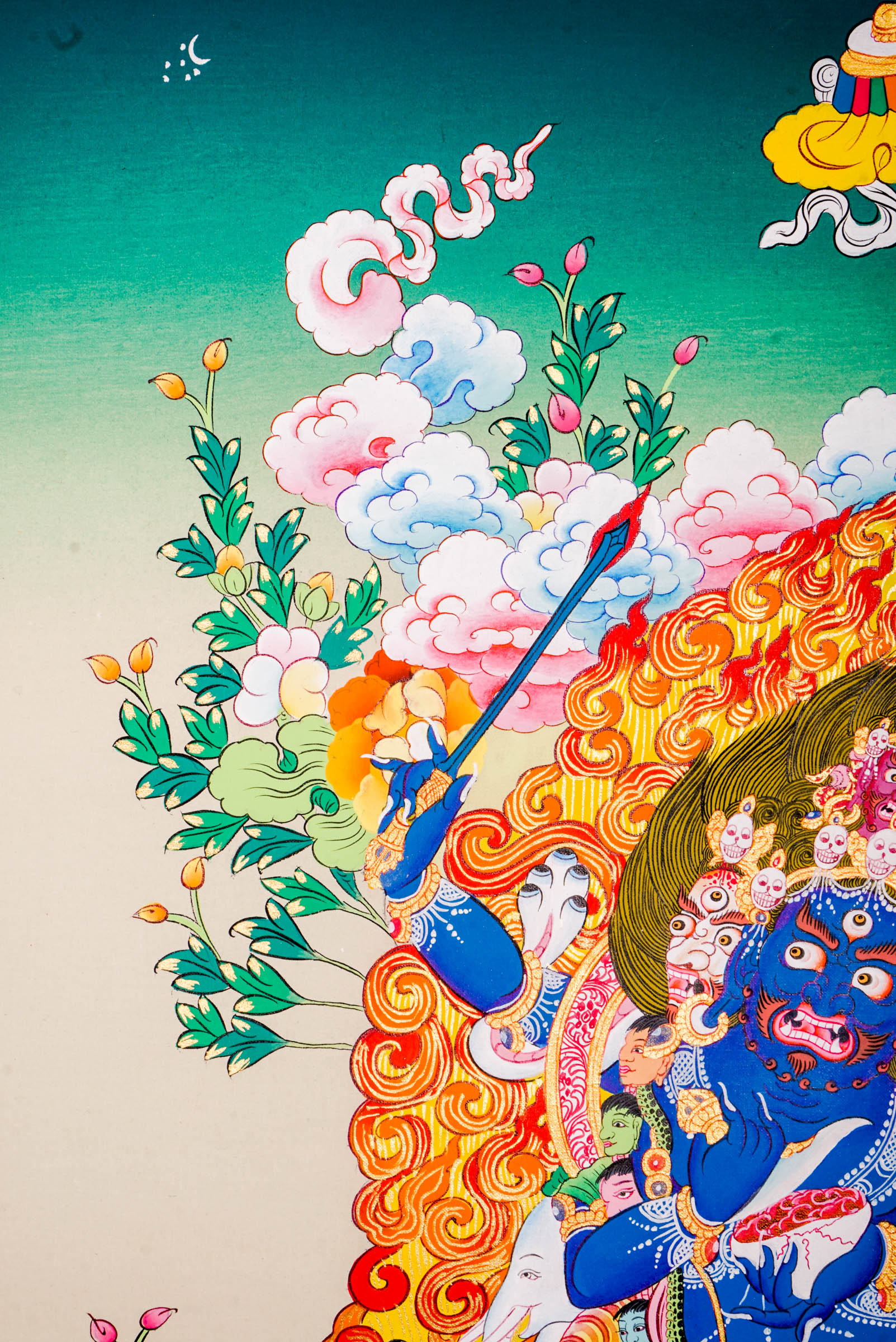 A sacred hand-painted Thangka Art using 24k gold and natural pigments of Mahakala, the fierce protector.