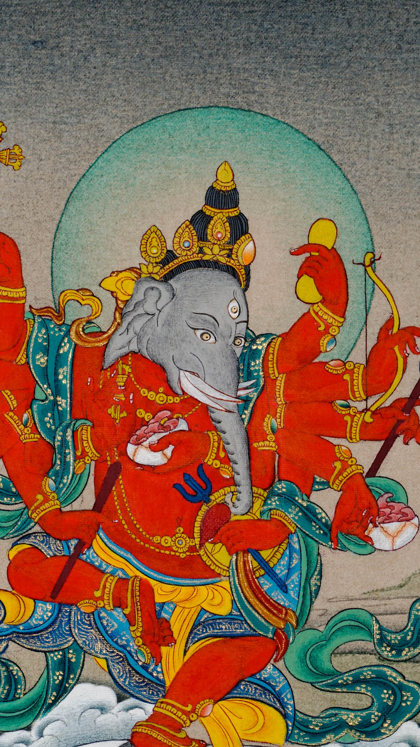 Tibetan thangka of red Ganesh with gray elephant face, multiple arms holding kapala, khadga, arrow, dhanush, fire sword, and vajra staff, standing on a mouse over a lotus throne with ritual offerings below