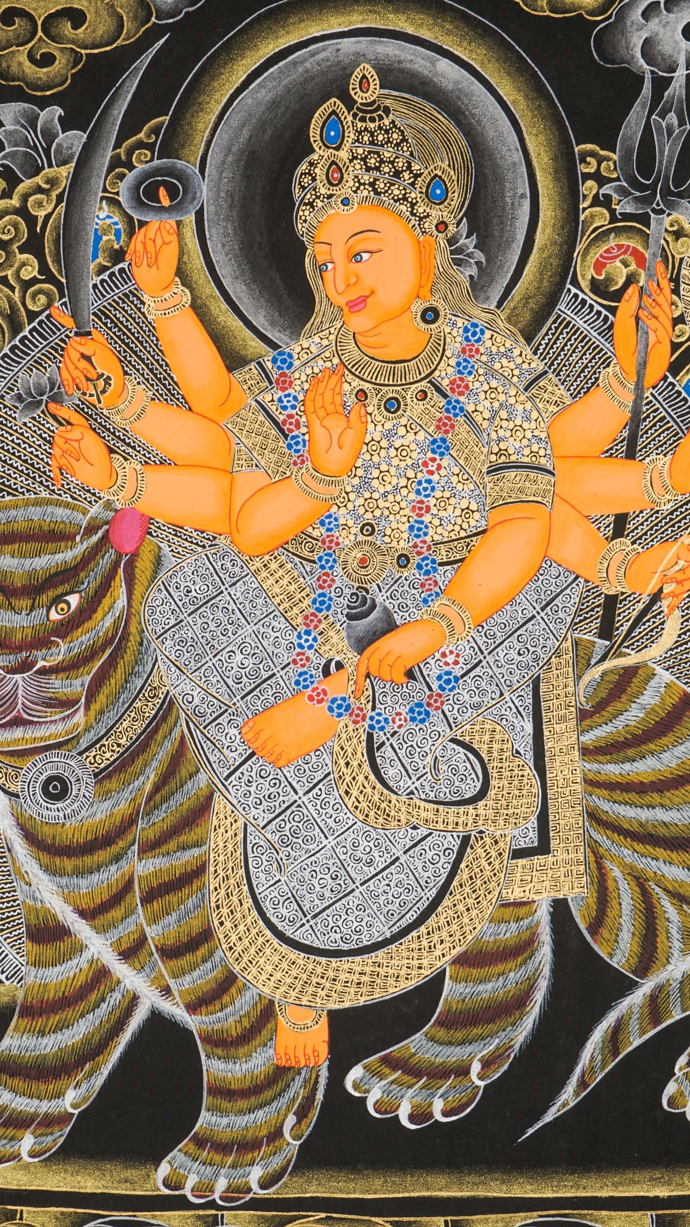 Durga Thangka of lion-riding goddess, armed and divine protector