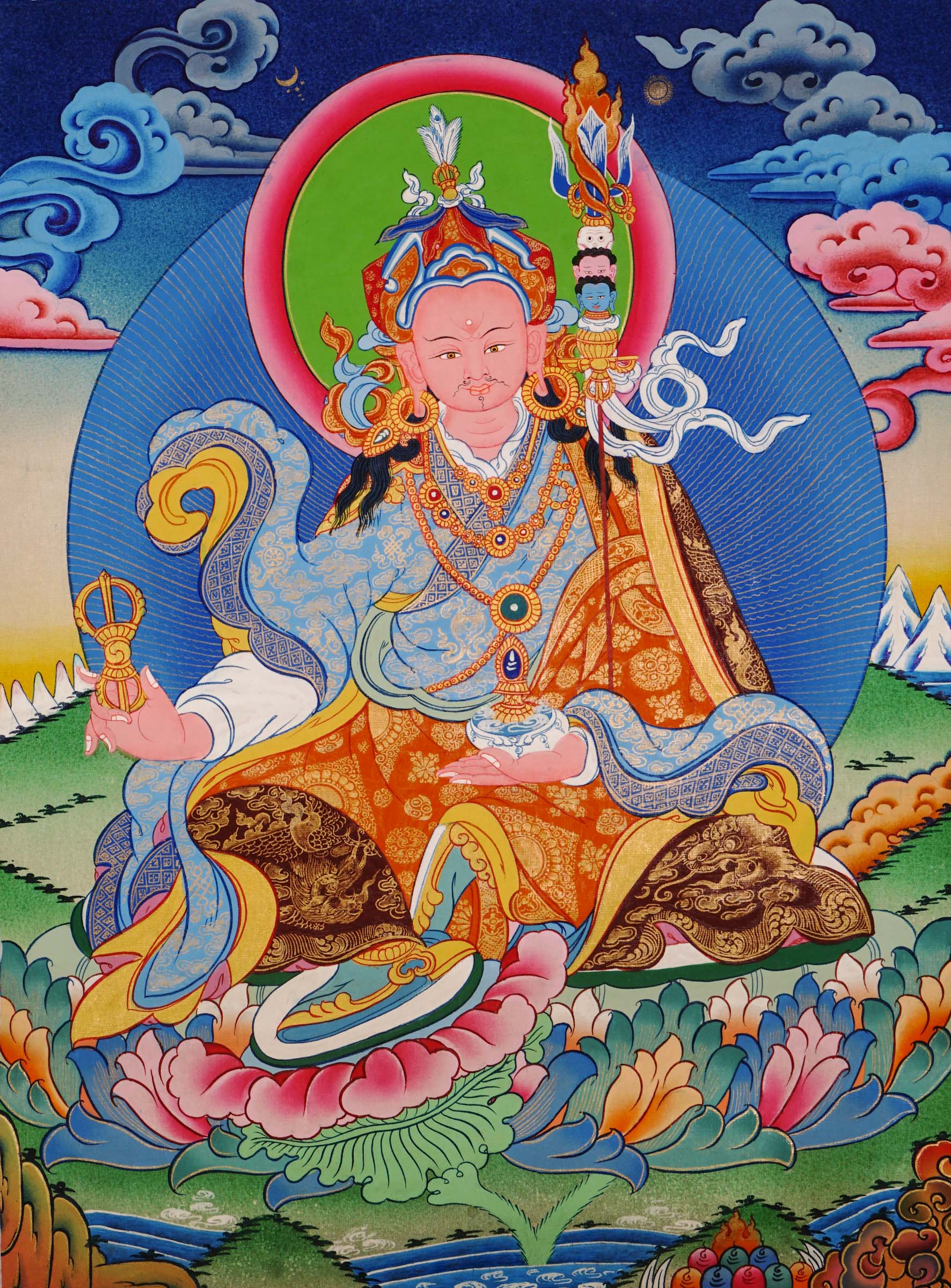 Hand-painted Guru Rinpoche thangka from Kathmandu, Nepal showing the master seated on a lotus throne holding a vajra, skull cup, and khatvanga staff with symbolic heads, adorned with robes, jewelry, and halo in traditional Tibetan Vajrayana style.
