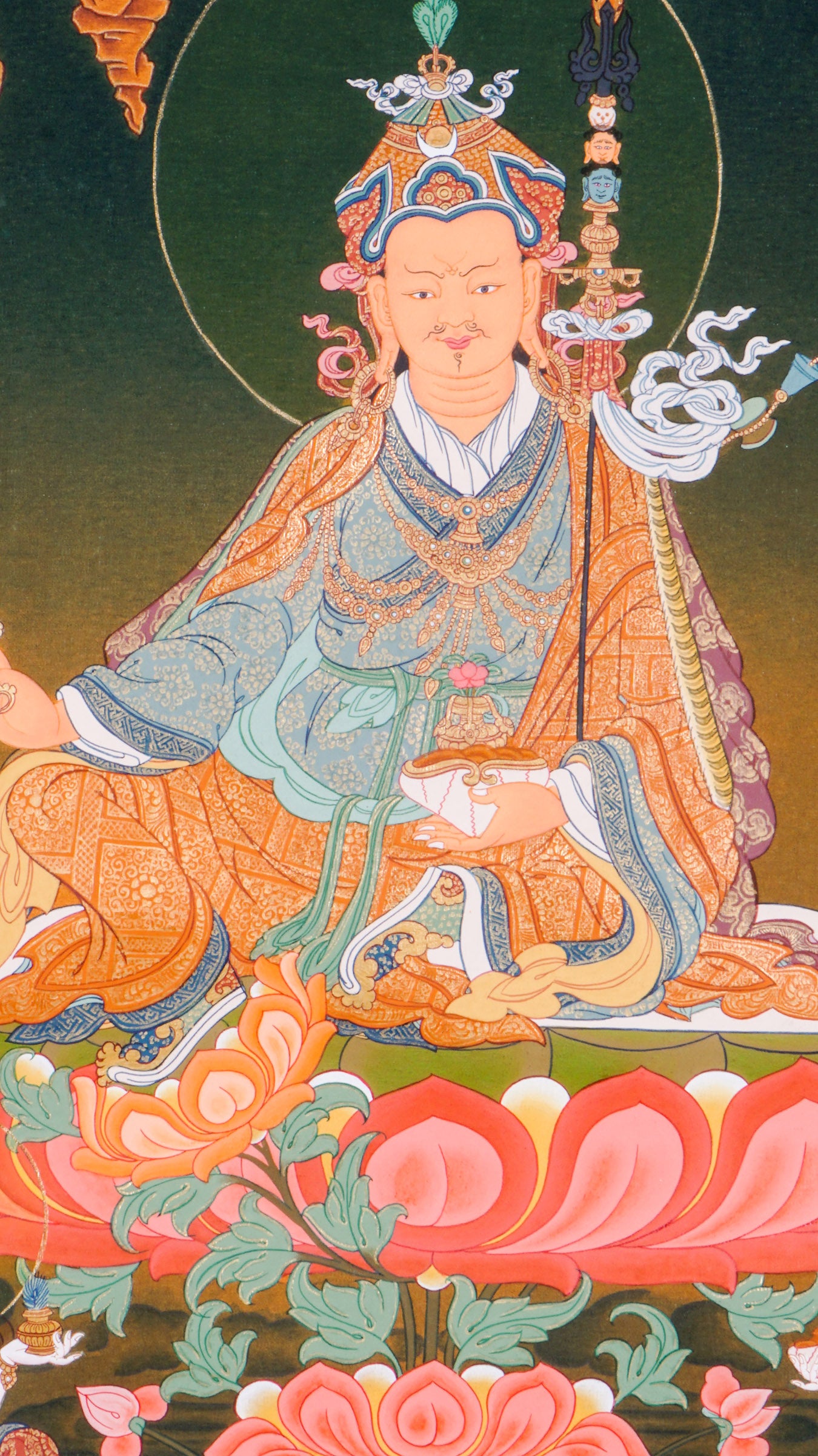The Guru Rinpoche Thangka, hand-painted using traditional techniques and natural pigments, honors Padmasambhava, the revered master who brought Buddhism to Tibet. This sacred Tibetan Buddhist thangka symbolizes wisdom, compassion, and spiritual protection, making it ideal for meditation, personal devotion, and authentic spiritual decor.