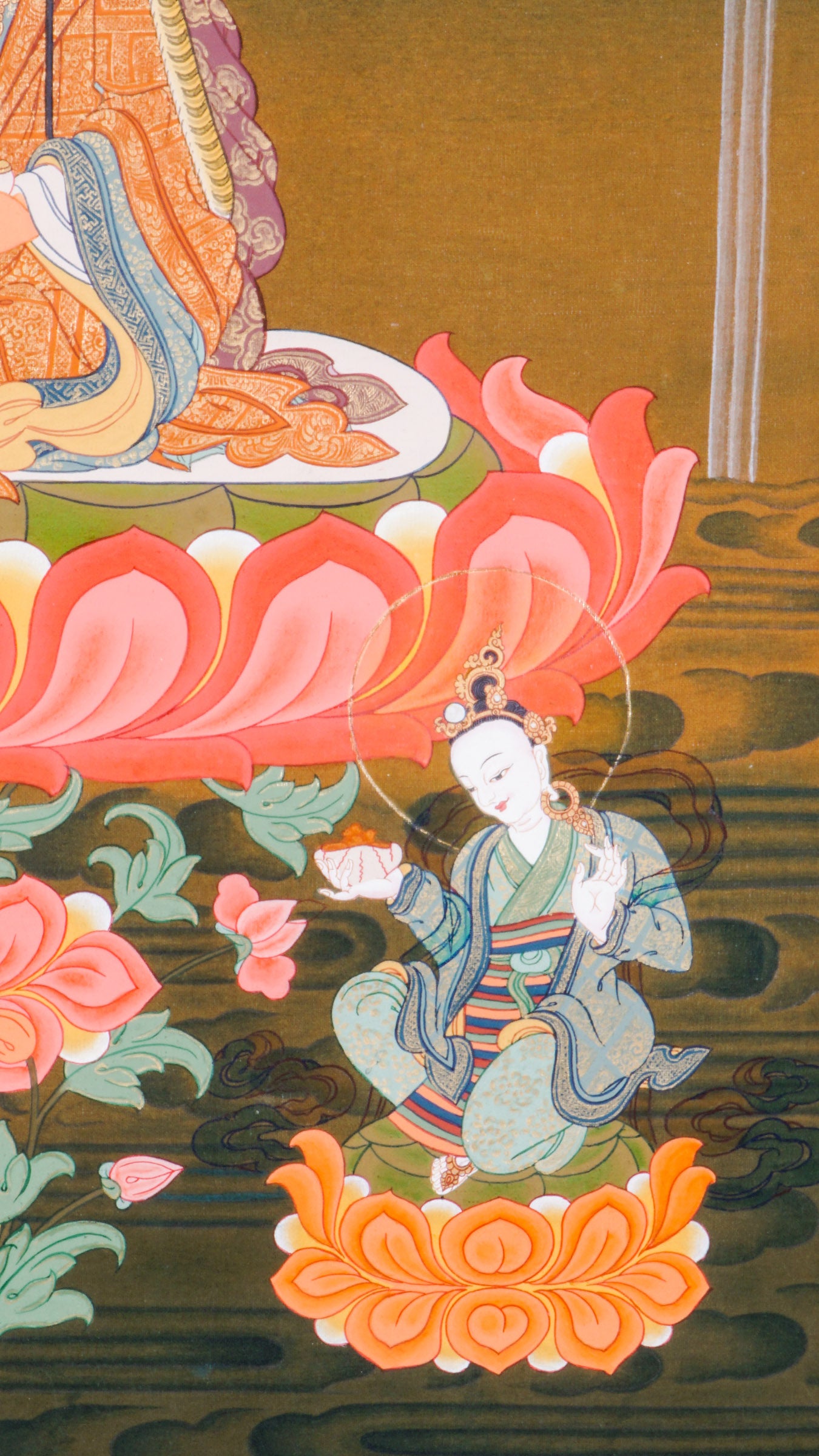 The Guru Rinpoche Thangka, hand-painted using traditional techniques and natural pigments, honors Padmasambhava, the revered master who brought Buddhism to Tibet. This sacred Tibetan Buddhist thangka symbolizes wisdom, compassion, and spiritual protection, making it ideal for meditation, personal devotion, and authentic spiritual decor.