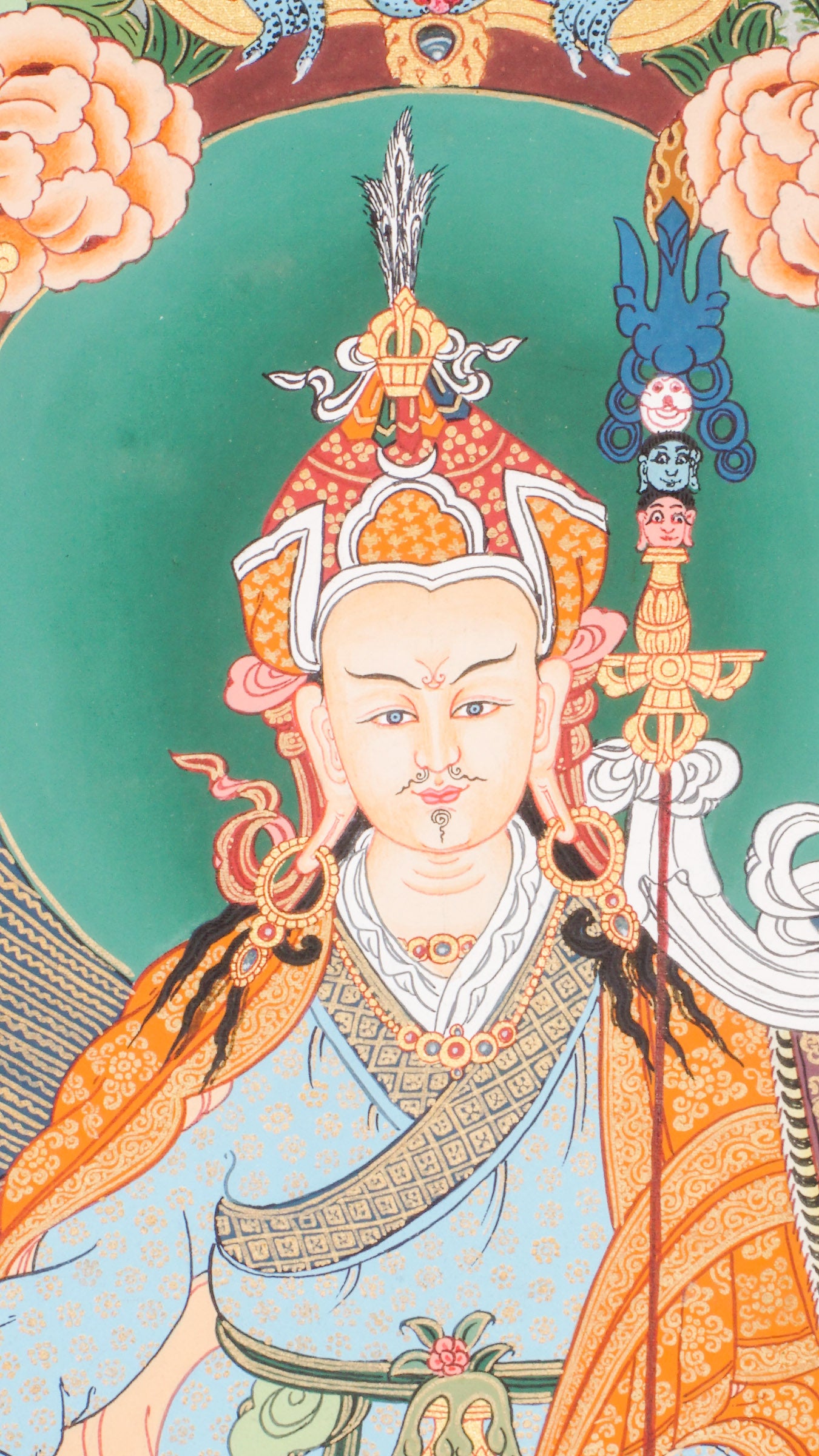 Guru Rinpoche Thangka is a sacred Tibetan Buddhist painting that honors Padmasambhava, the enlightened master known for introducing Buddhism to Tibet and removing obstacles with wisdom and compassion. Hand-painted with natural mineral pigments, this thangka brings blessings of protection, spiritual power, and peace to any meditation or sacred space.