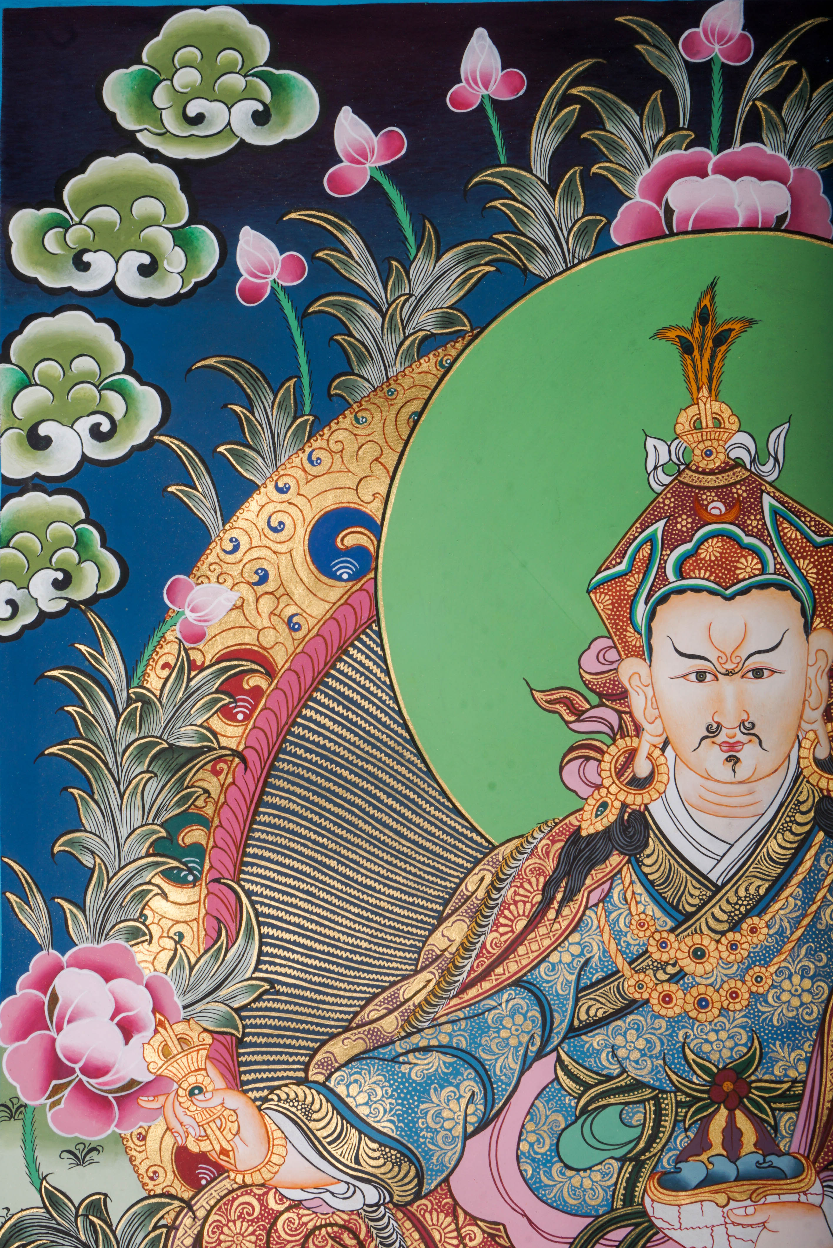 Sacred Thangka art of Guru Padmasambhava from the Nyingma lineage, depicted with vajra resting on his lap. A peaceful yet powerful image symbolizing wisdom, stability, and enlightened transmission. Perfect for meditation and devotional spaces.