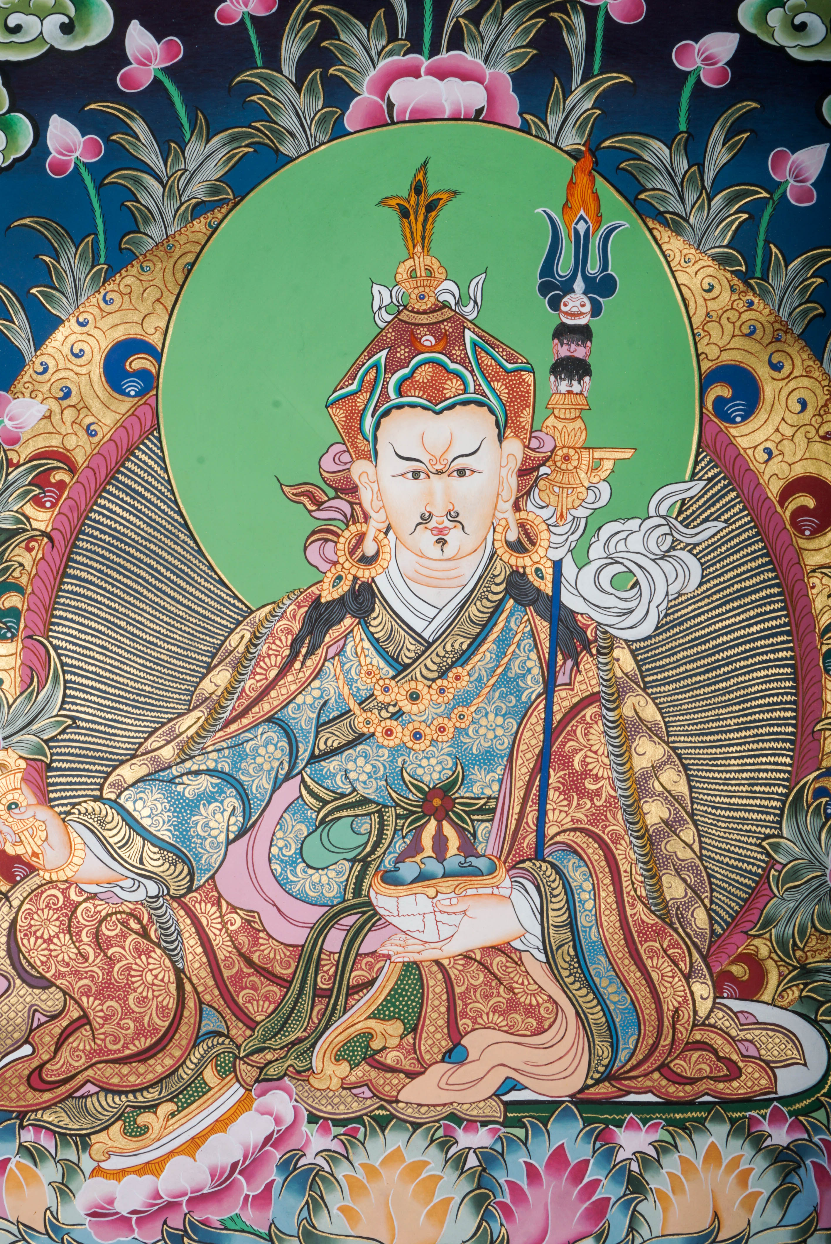 Sacred Thangka art of Guru Padmasambhava from the Nyingma lineage, depicted with vajra resting on his lap. A peaceful yet powerful image symbolizing wisdom, stability, and enlightened transmission. Perfect for meditation and devotional spaces.