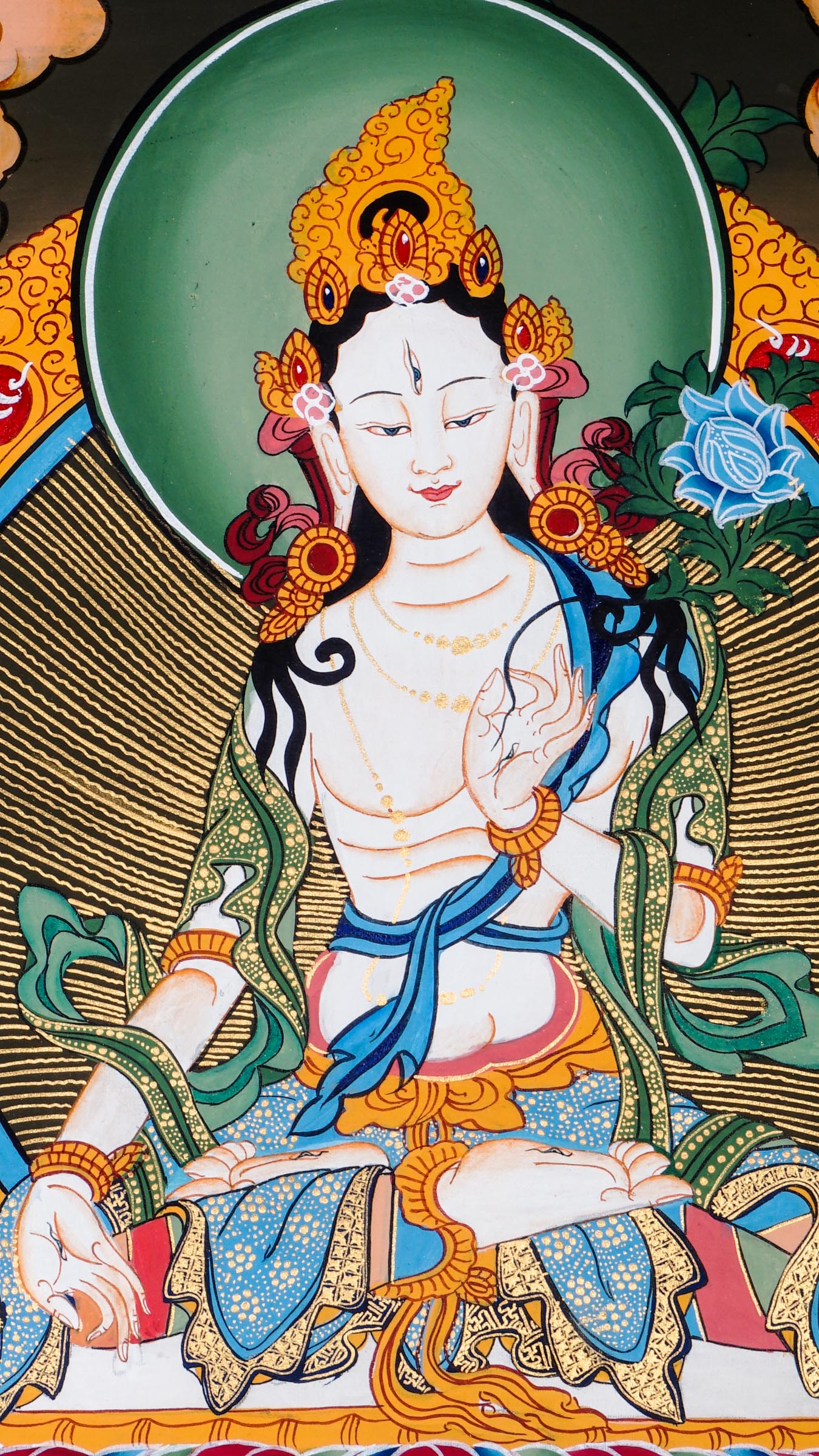 Beautiful artwork of White Tara Thangka representing bodhisattva of compassion.