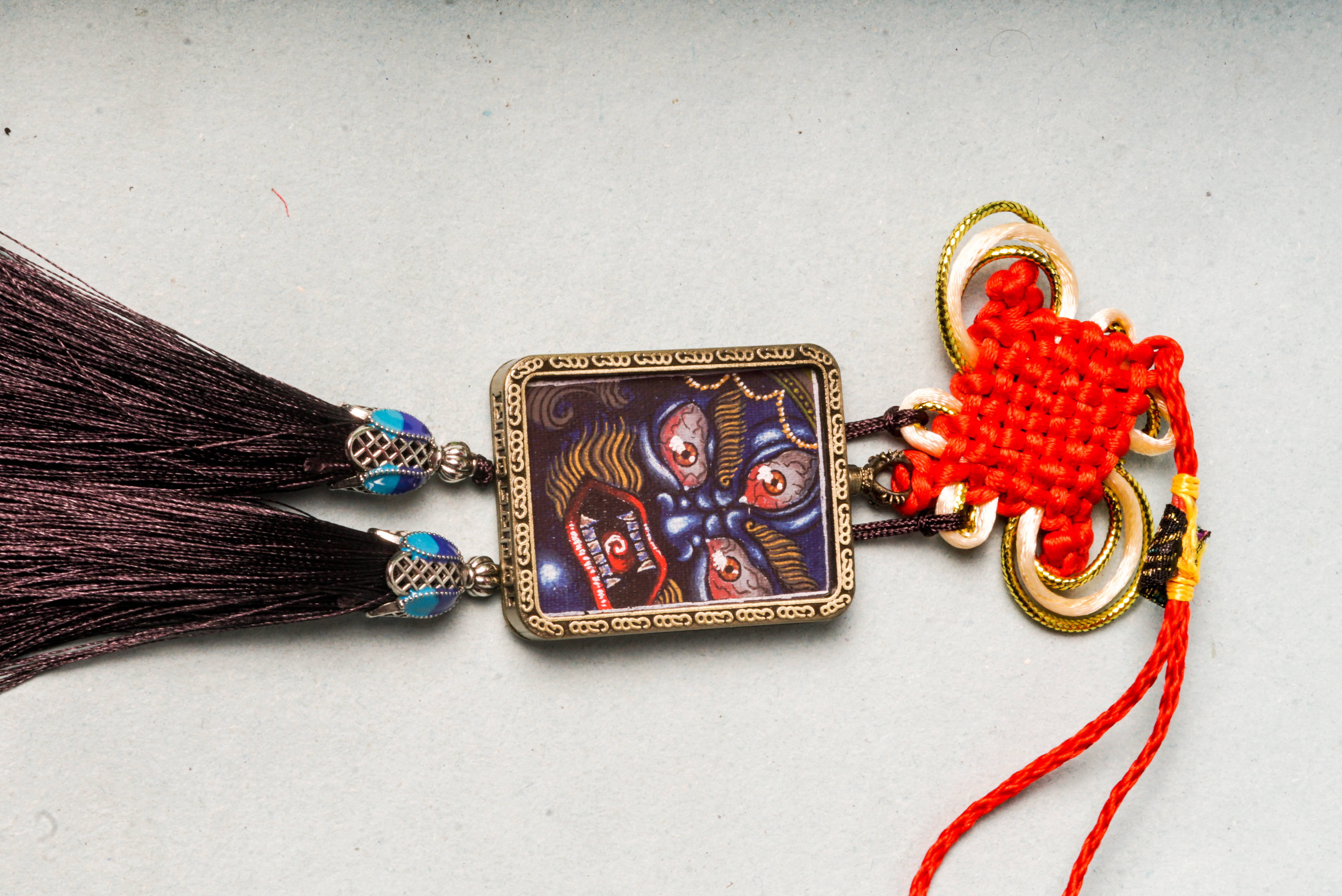 Mahakala, the fierce guardian in Tibetan Buddhism, symbolizes protection, transformation, and the removal of spiritual obstacles. This hand-painted Mahakala Ghau Thangka serves as both a sacred artwork and a powerful talisman, perfect for deepening meditation and invoking divine protection.
