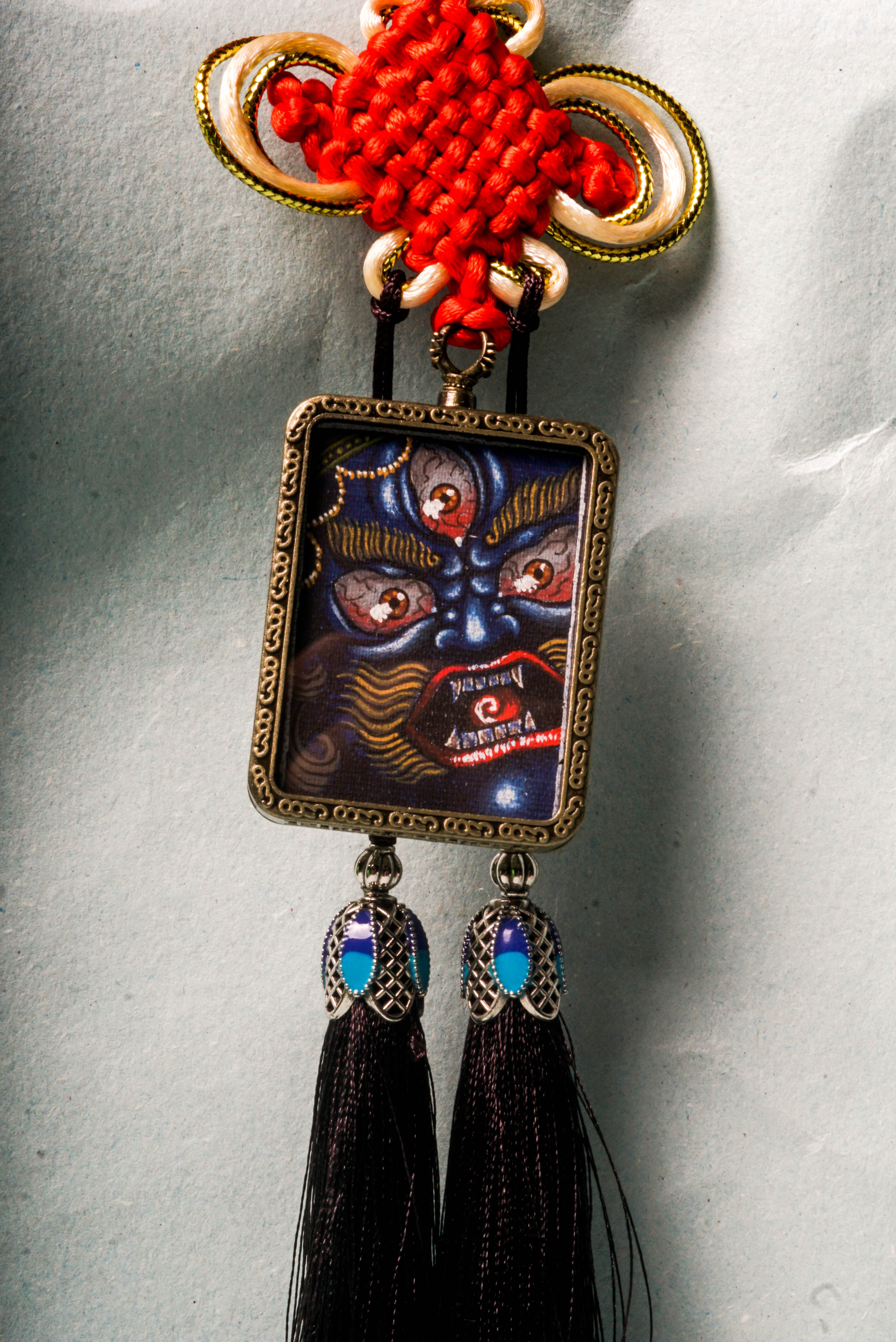 Mahakala, the fierce guardian in Tibetan Buddhism, symbolizes protection, transformation, and the removal of spiritual obstacles. This hand-painted Mahakala Ghau Thangka serves as both a sacred artwork and a powerful talisman, perfect for deepening meditation and invoking divine protection.