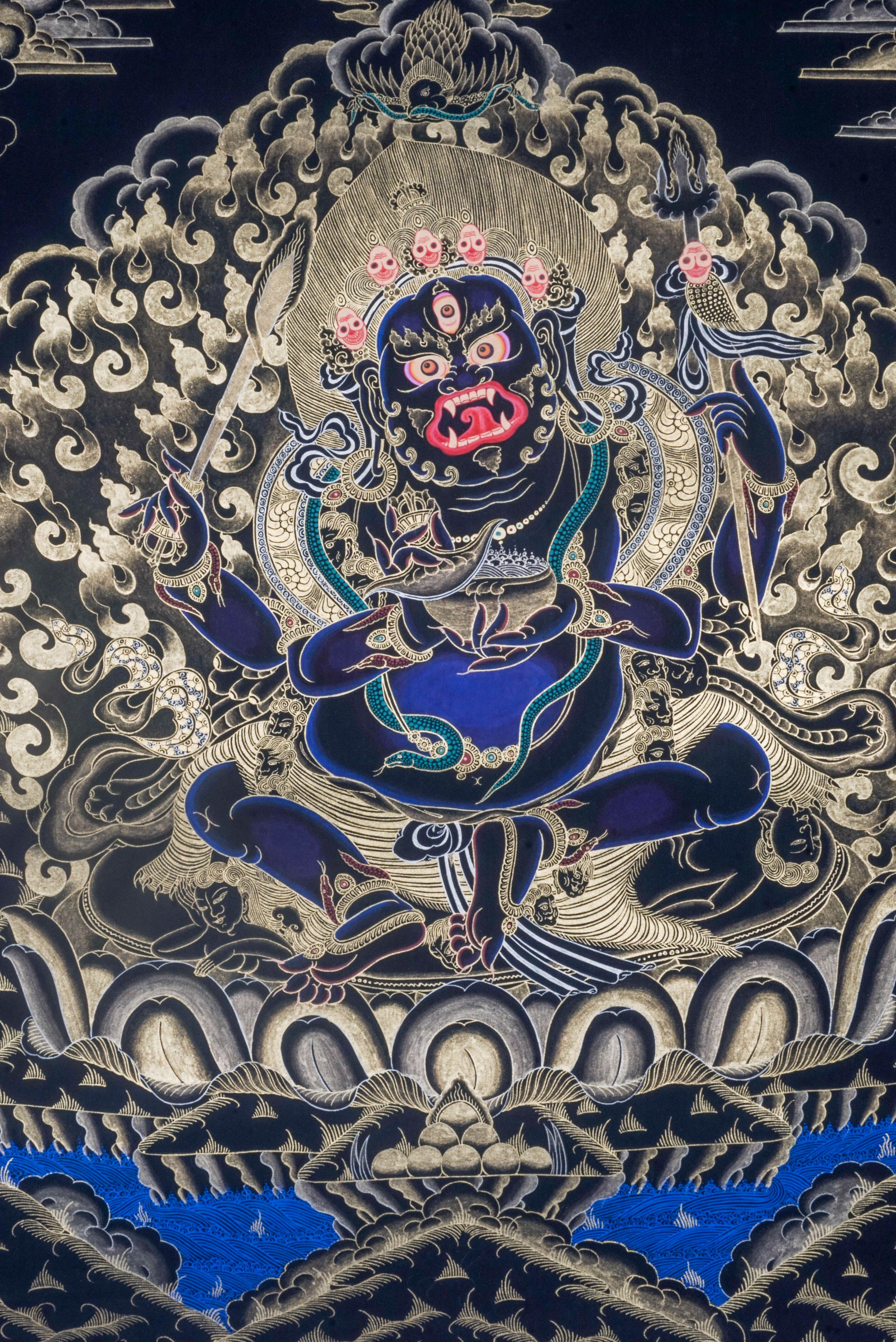 The Mahakala Thangka Painting captures the fierce protector of Tibetan Buddhism, symbolizing strength, transformation, and the removal of obstacles. Hand-painted with natural pigments and gold accents, this powerful artwork brings protection, focus, and deep spiritual energy to any sacred space.