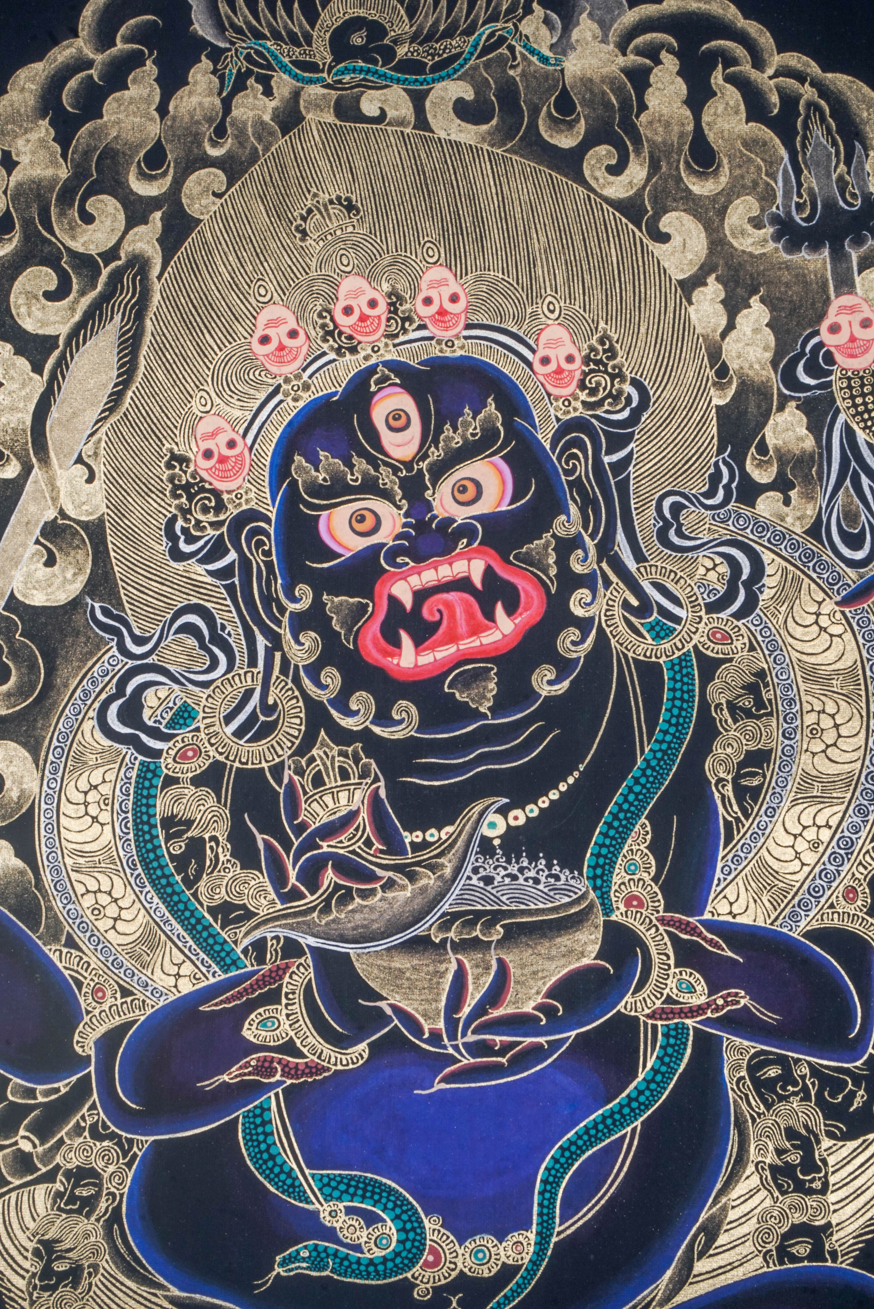 The Mahakala Thangka Painting captures the fierce protector of Tibetan Buddhism, symbolizing strength, transformation, and the removal of obstacles. Hand-painted with natural pigments and gold accents, this powerful artwork brings protection, focus, and deep spiritual energy to any sacred space.