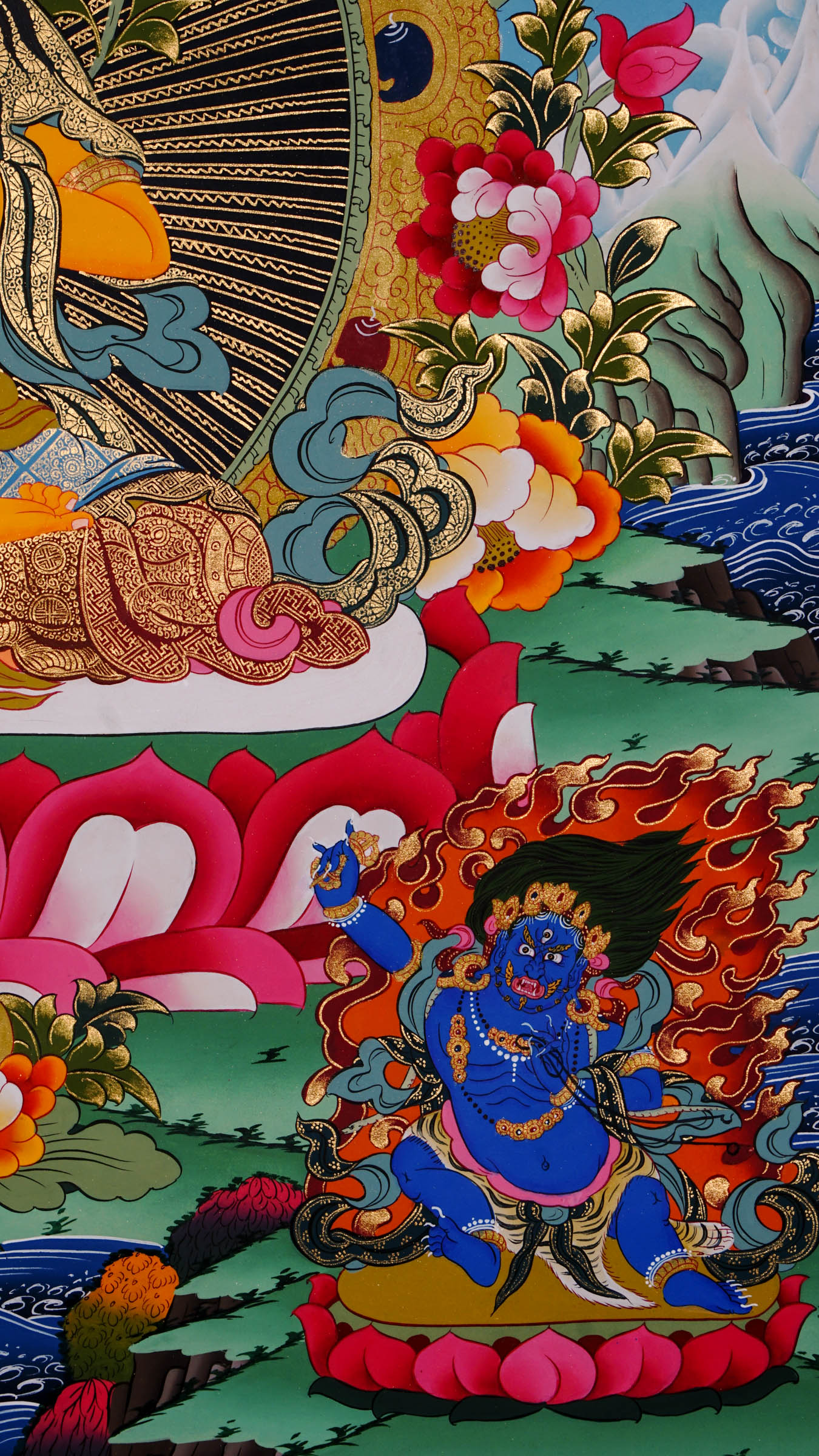 Hand painted Manjushri thangka from Kathmandu, Nepal, depicting the Bodhisattva of wisdom seated on a lotus throne holding a flaming sword and sutra on lotus, with Chenrezig, Mahakala, and Five Dhyani Buddhas, in traditional Tibetan Vajrayana style with 24k gold.