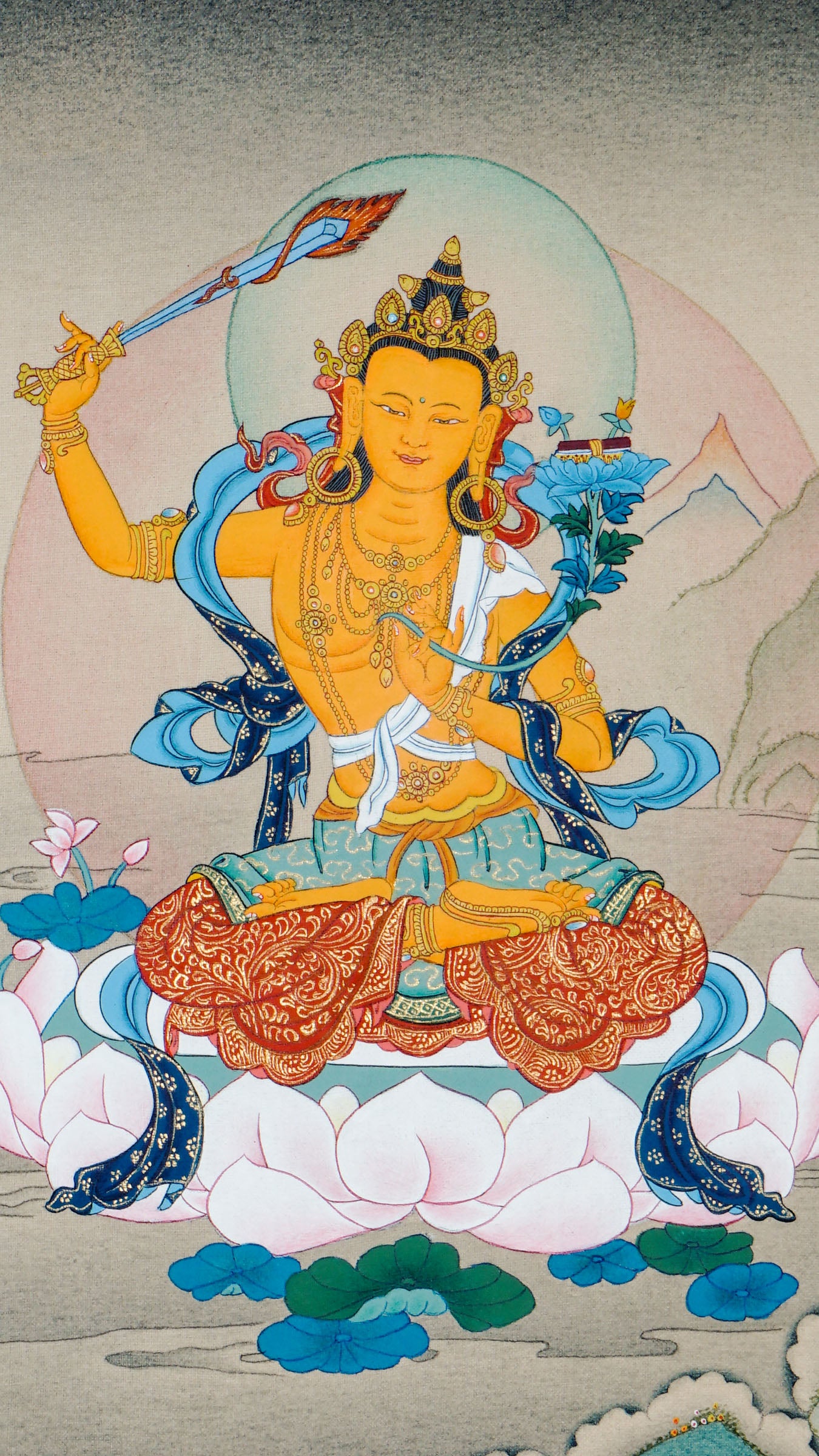 Tibetan thangka of Manjushri, the Bodhisattva of Wisdom, holding a flaming sword and lotus with a sutra, seated on a lotus throne with a serene background.