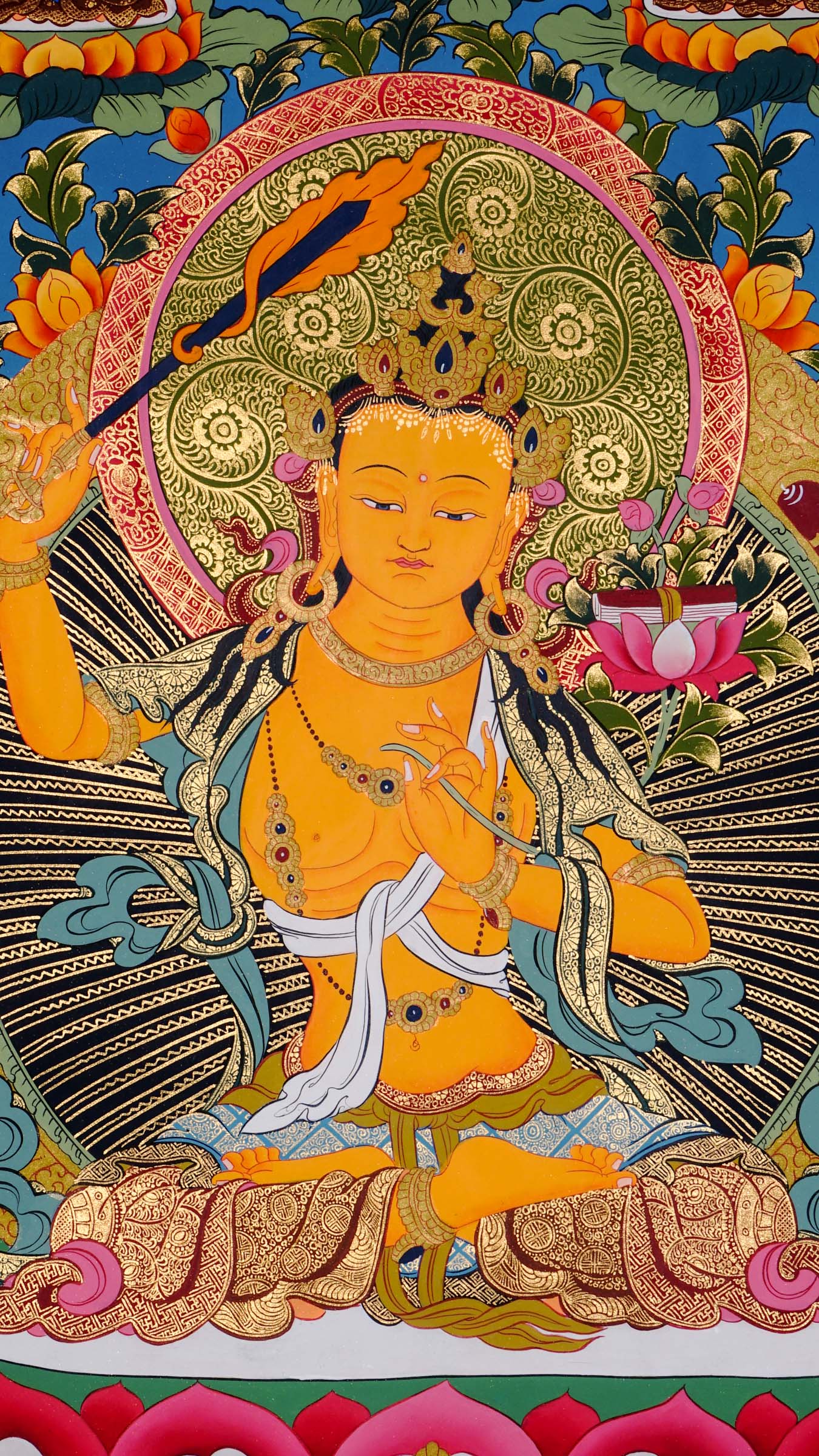 Hand painted Manjushri thangka from Kathmandu, Nepal, depicting the Bodhisattva of wisdom seated on a lotus throne holding a flaming sword and sutra on lotus, with Chenrezig, Mahakala, and Five Dhyani Buddhas, in traditional Tibetan Vajrayana style with 24k gold.