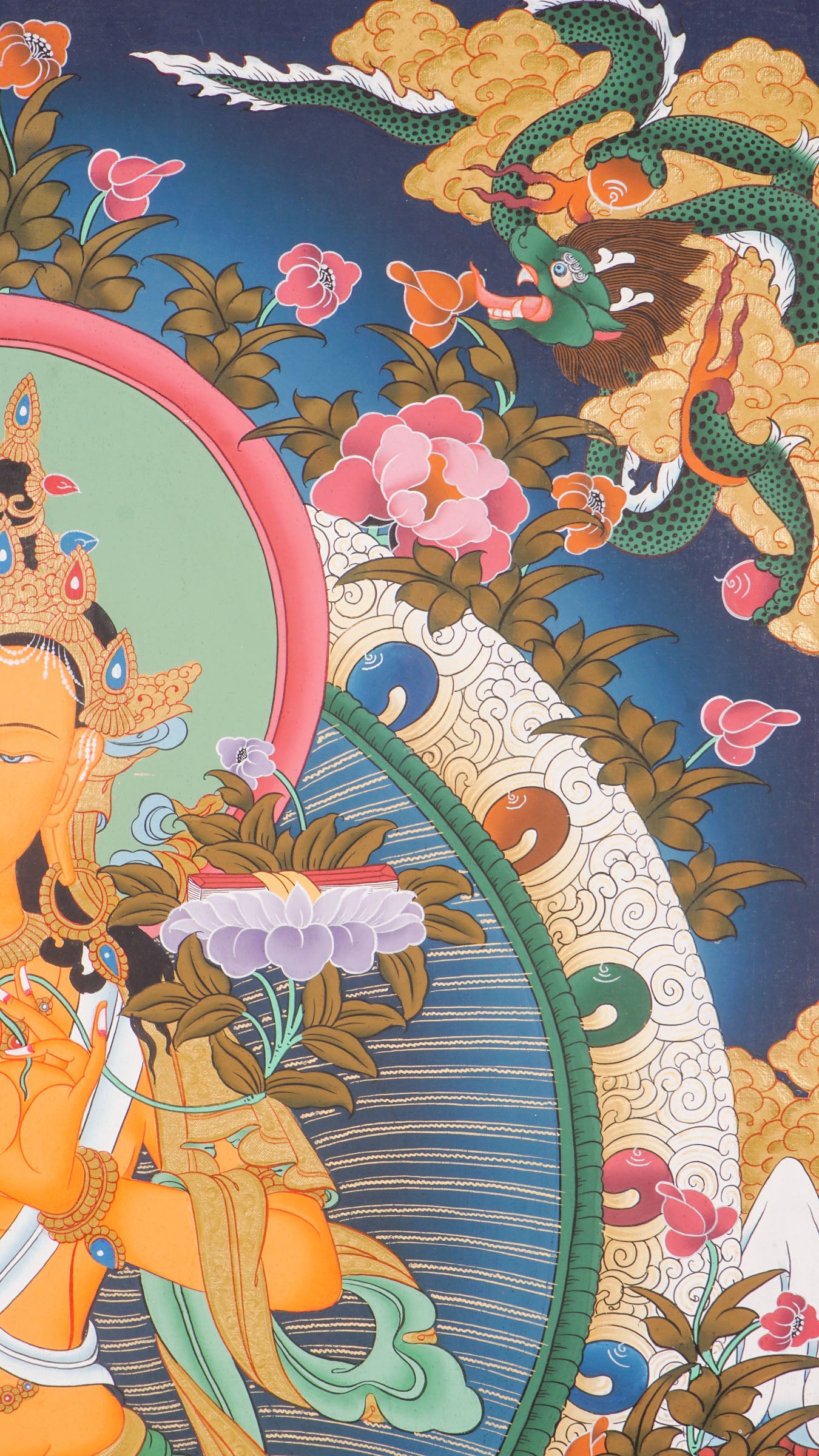 The Manjushree Thangka depicting the Bodhisattva of Wisdom seated on a lotus, holding a sword and a scripture.