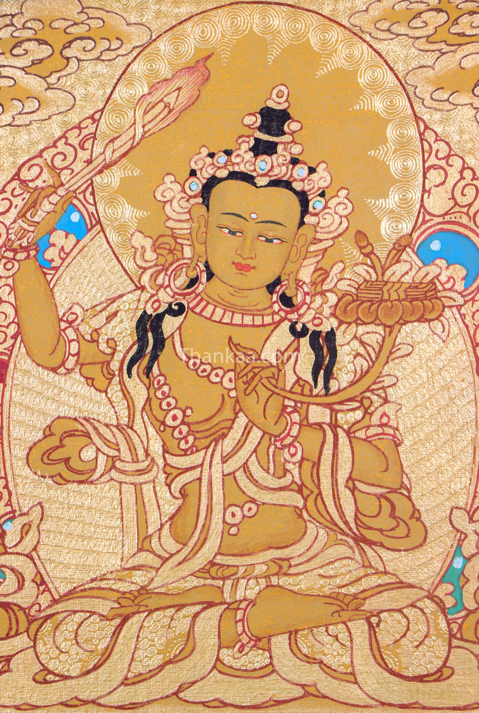 This Manjushri Thangka painting beautifully portrays the Bodhisattva of wisdom, holding a sword to cut through ignorance and a scripture to symbolize supreme knowledge. Hand-painted with natural pigments, it is a powerful piece for enhancing clarity, meditation, and spiritual growth.