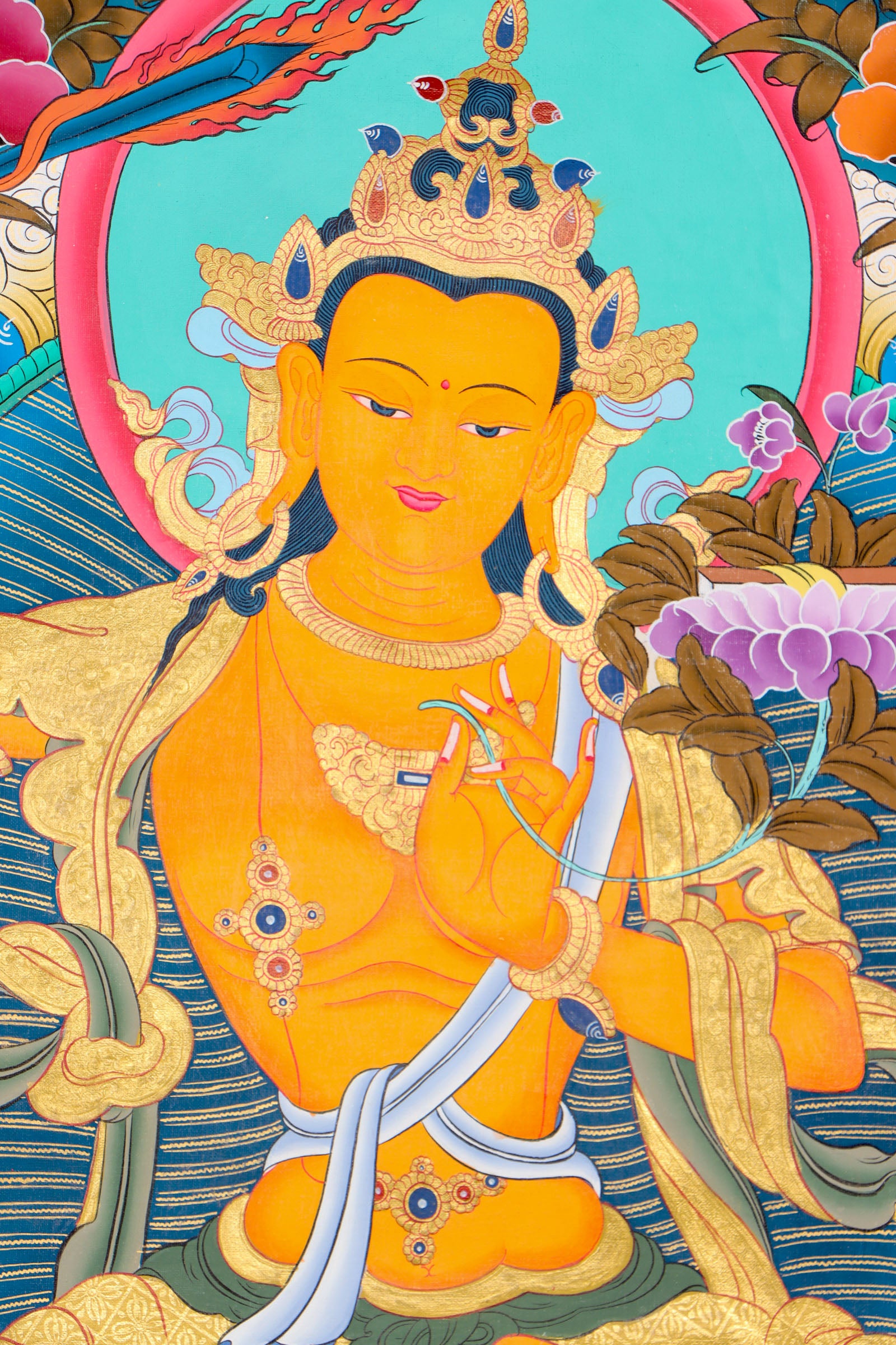 This genuine Manjushri Thangka captures the Bodhisattva of wisdom holding his iconic sword and scripture, symbolizing the power to cut through ignorance and reveal ultimate truth. Hand-painted with natural mineral pigments on canvas, it is a powerful spiritual tool for those seeking clarity, insight, and enlightenment.