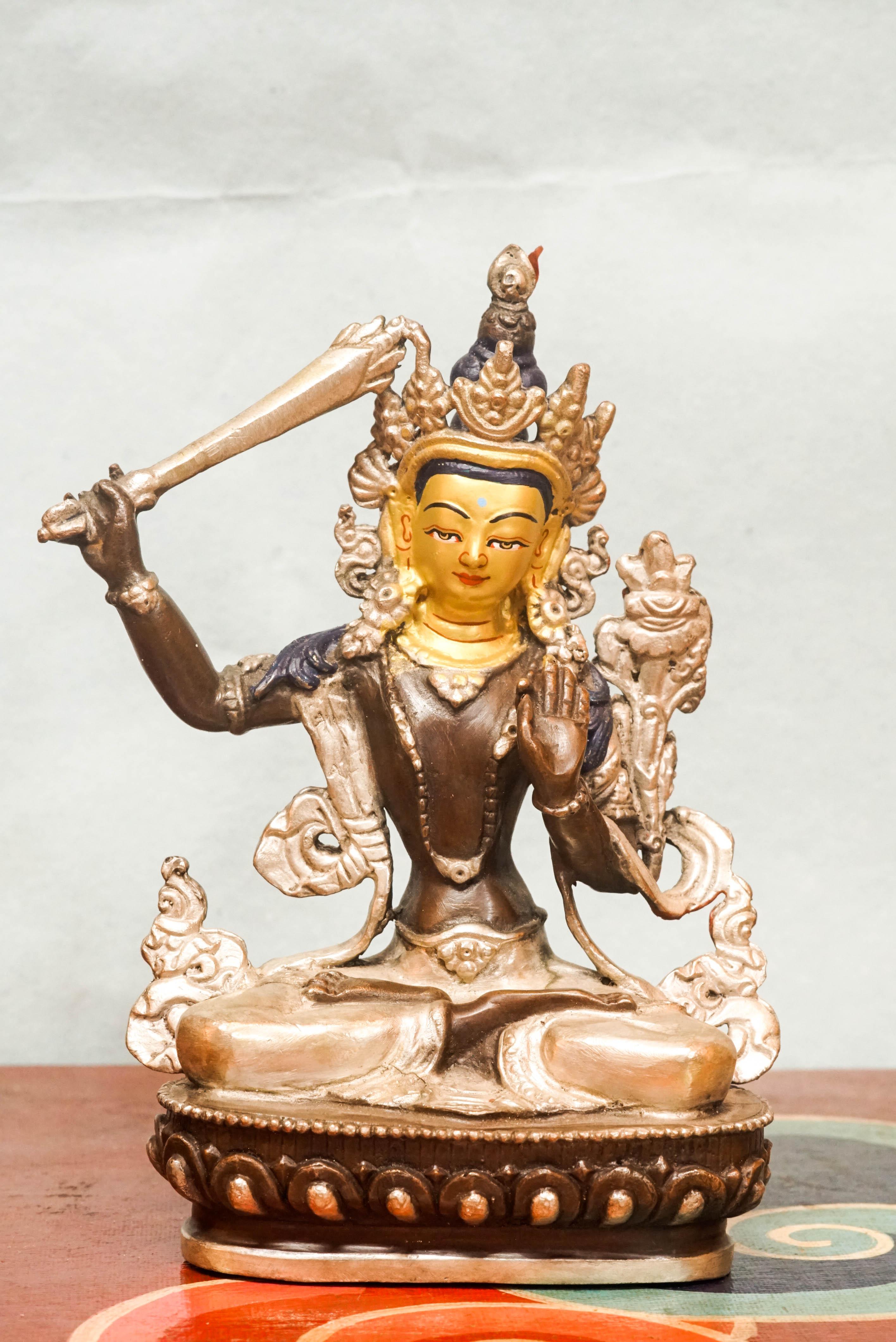 Statue of Manjushri, the Bodhisattva of Wisdom, serving powerful symbol for meditation, altar display, and spiritual growth.