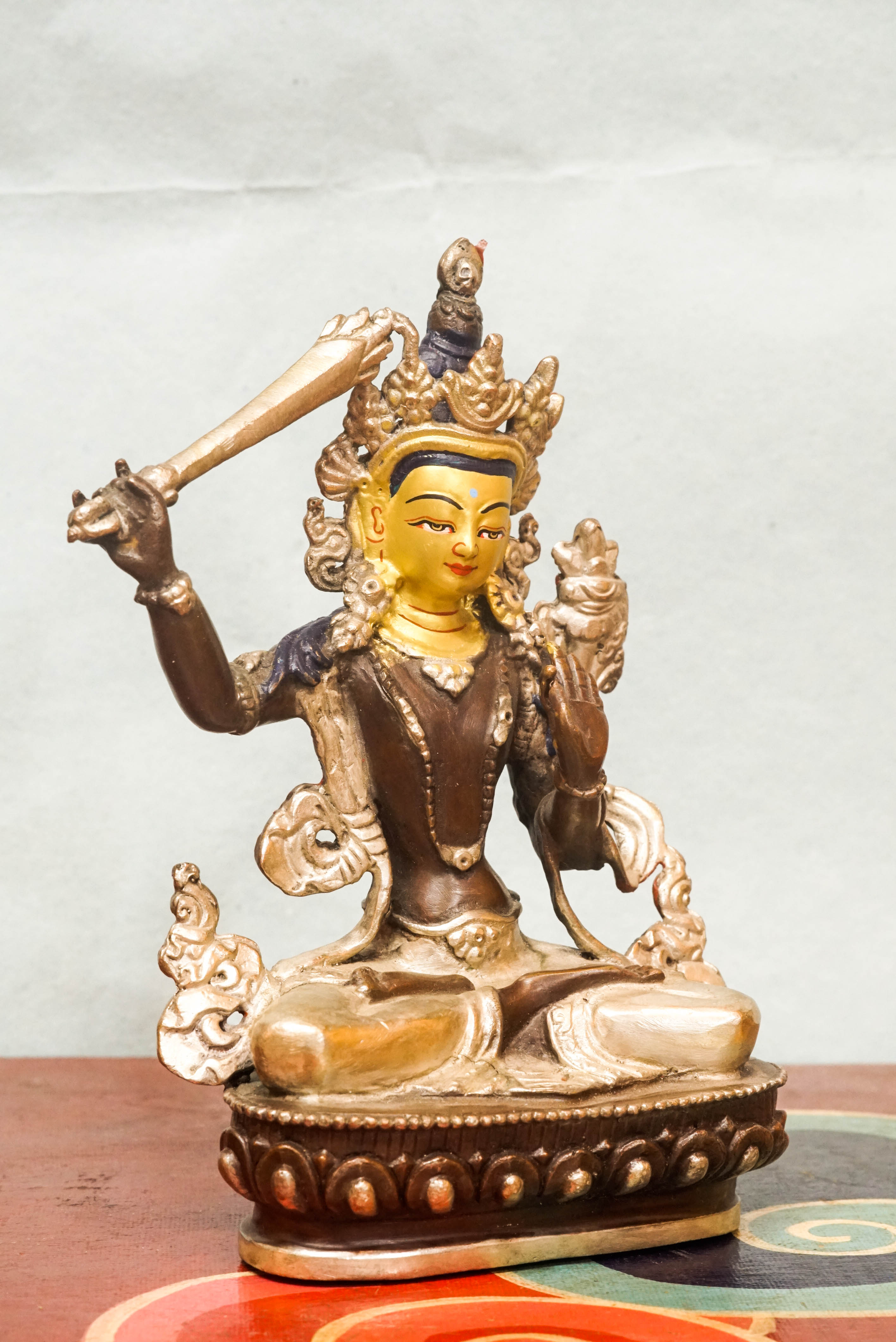 Statue of Manjushri, the Bodhisattva of Wisdom, serving powerful symbol for meditation, altar display, and spiritual growth.