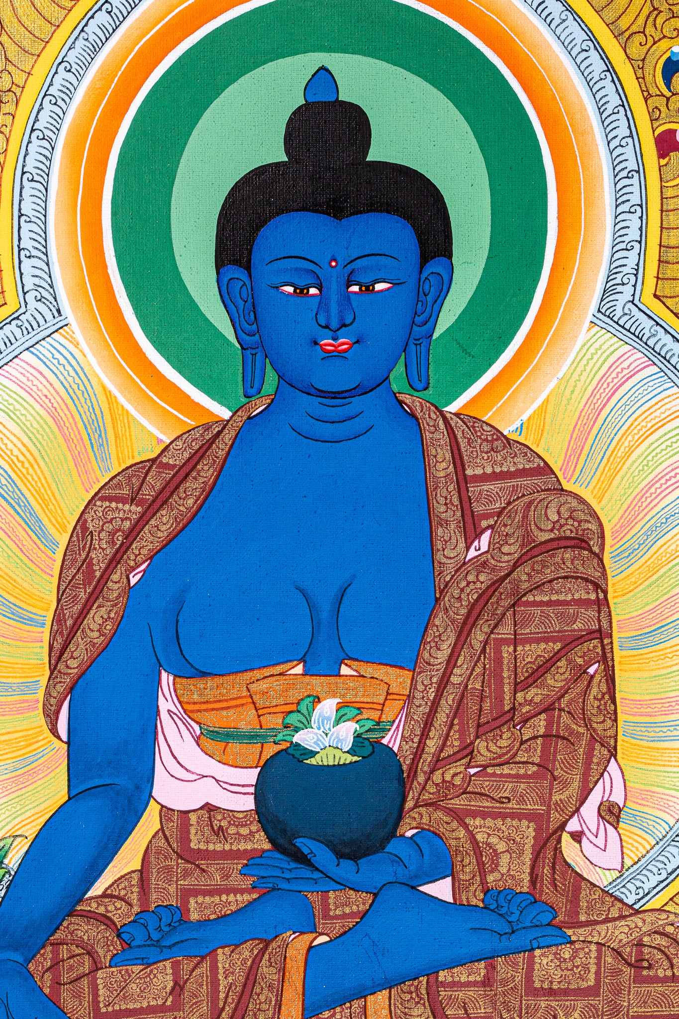 This Thangka painting of Medicine Buddha is a beautiful and effective way to enhance spiritual wellness and healing in sacred spaces or meditation rooms.
