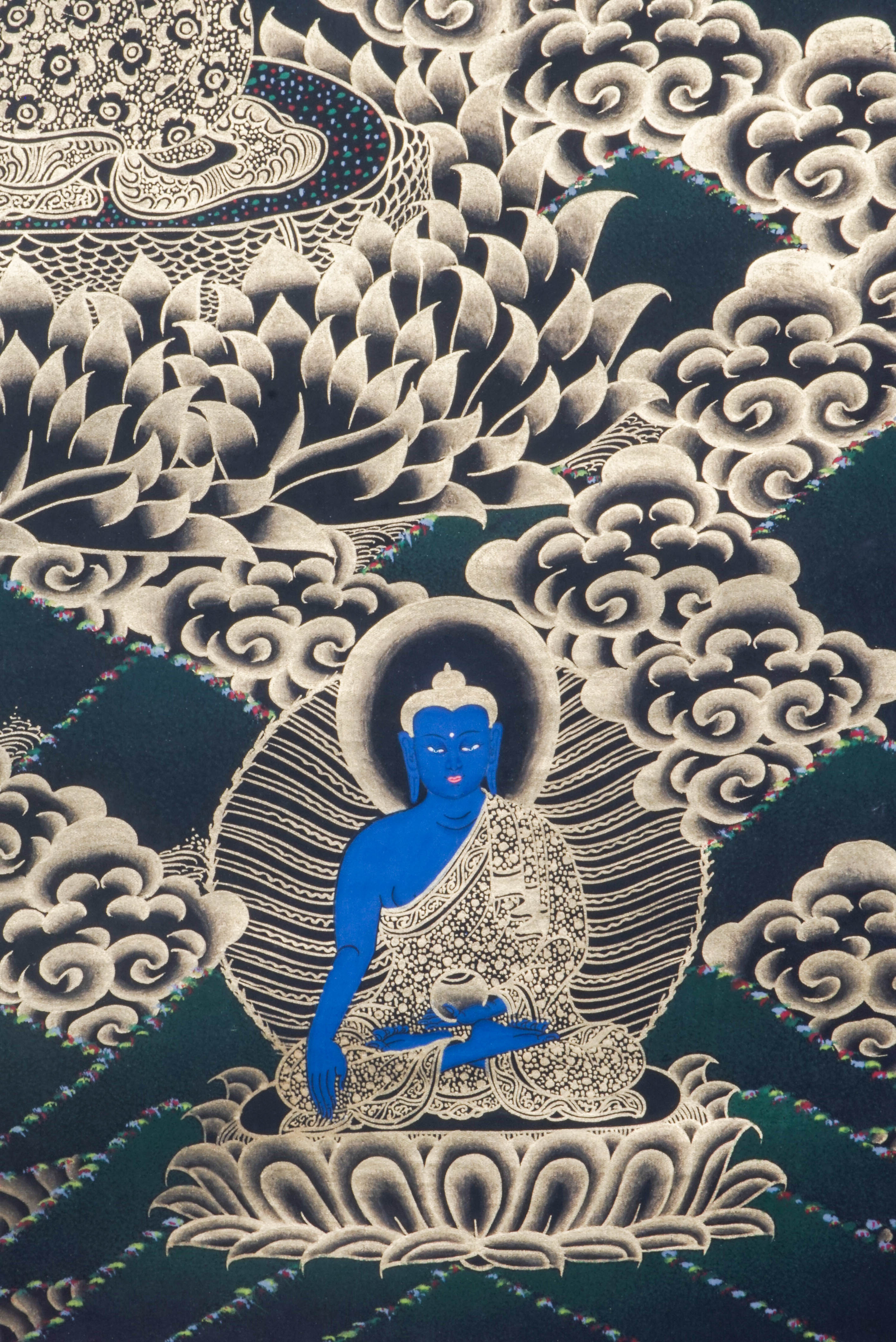 Medicine Buddha Thangka shows Bhaisajyaguru, the healing Buddha in Tibetan Buddhism, holding healing nectar and medicinal plant. Hand-painted with natural pigments by Tibetan artisans, it radiates peace and healing energy.