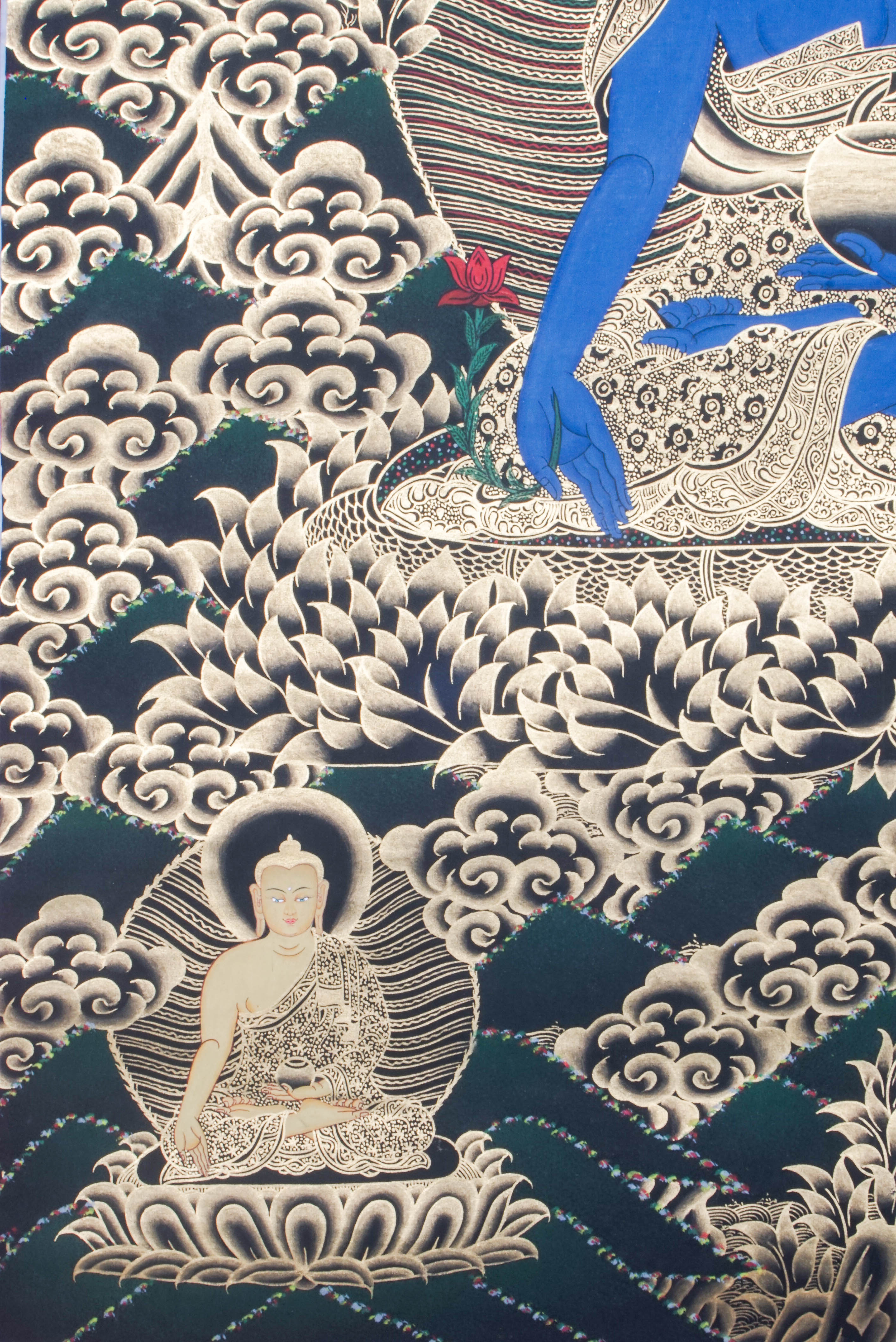 Medicine Buddha Thangka shows Bhaisajyaguru, the healing Buddha in Tibetan Buddhism, holding healing nectar and medicinal plant. Hand-painted with natural pigments by Tibetan artisans, it radiates peace and healing energy.