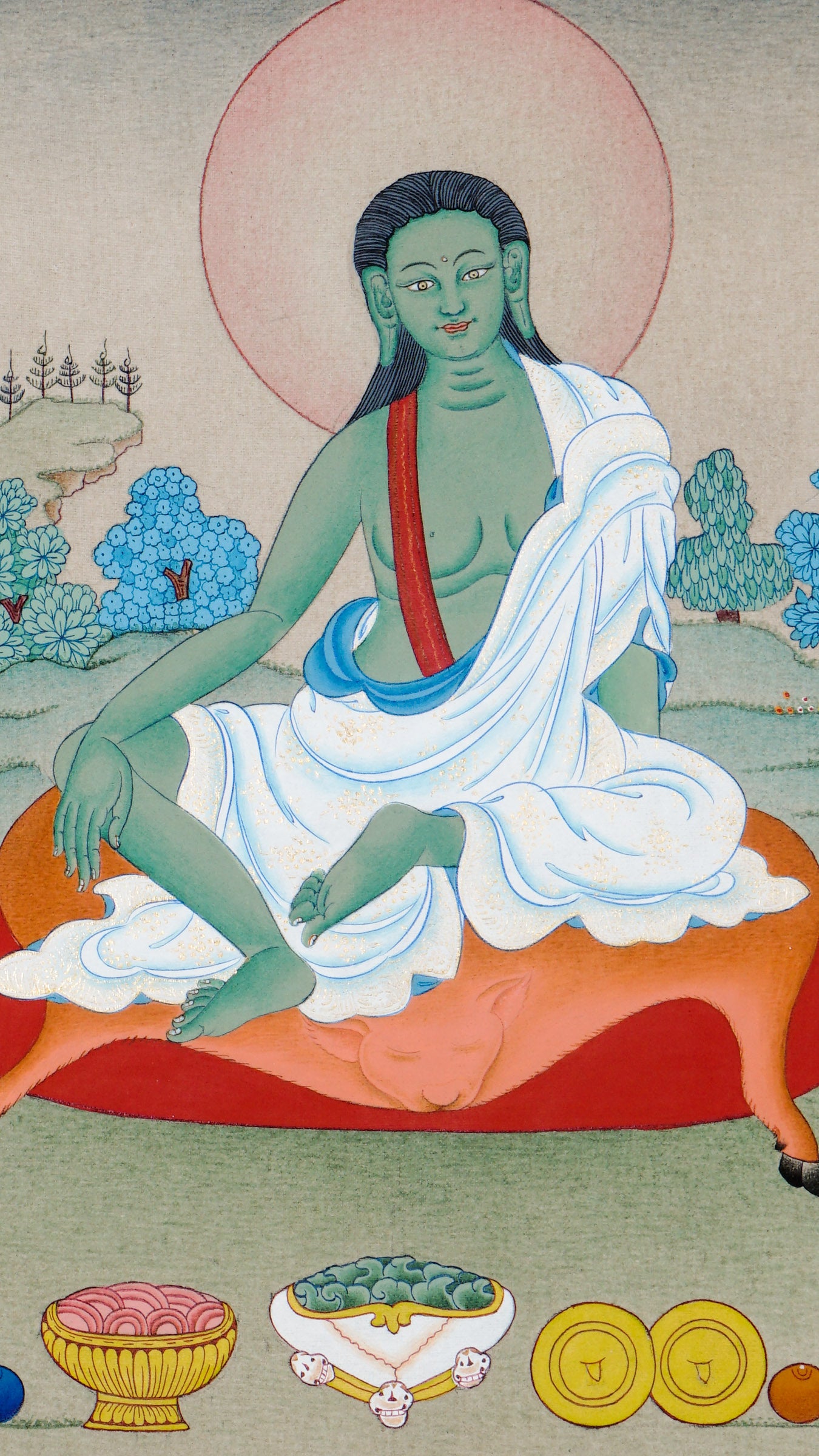 Tibetan thangka of Milarepa seated on a deer-skin mat with greenish body, hands resting calmly, surrounded by a peaceful landscape with trees and offerings.