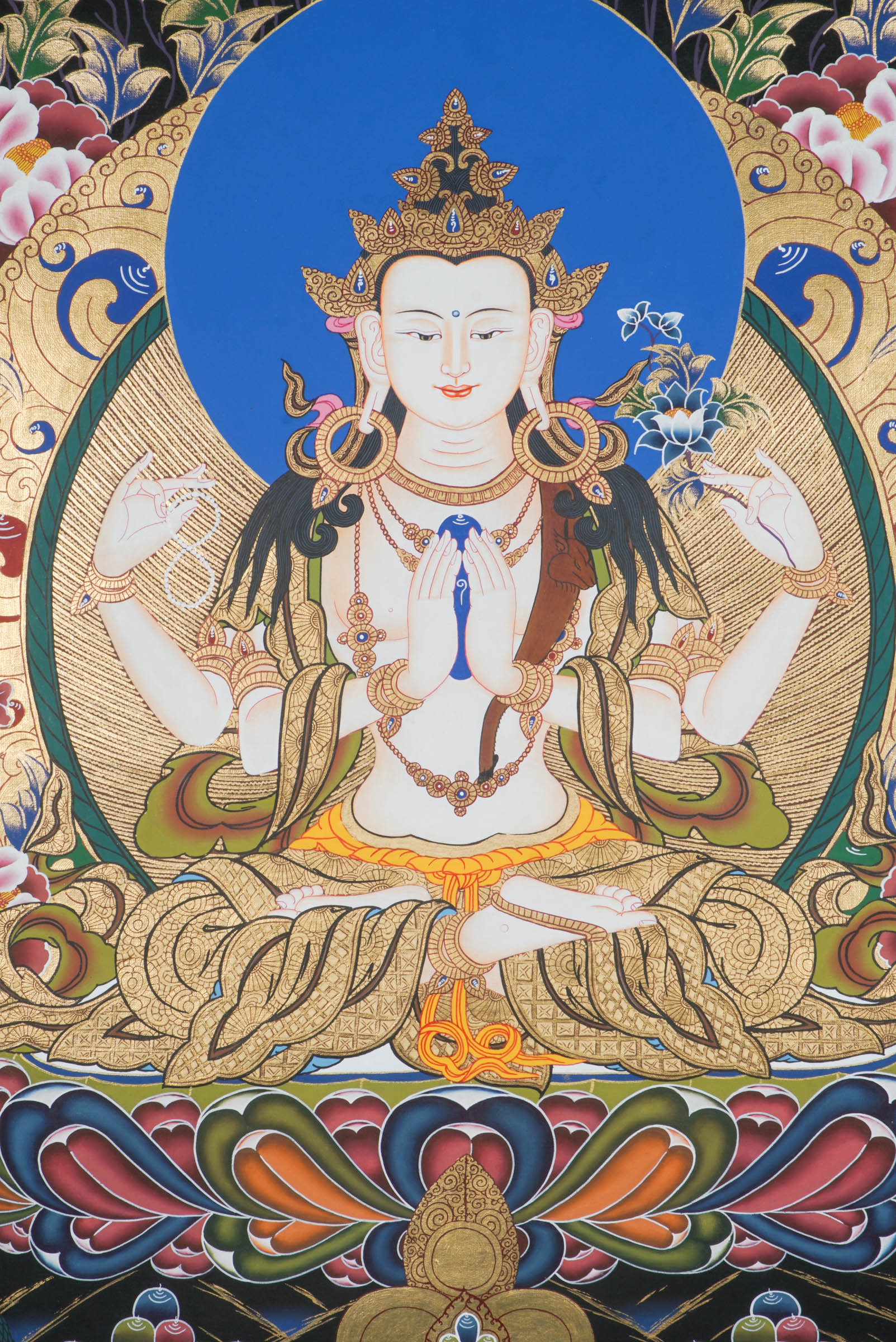 Hand-painted Thangka art portraying Chengresi, Avalokiteshvara in her serene form seated in a Lotus throne, created with 24k gold and natural pigments.