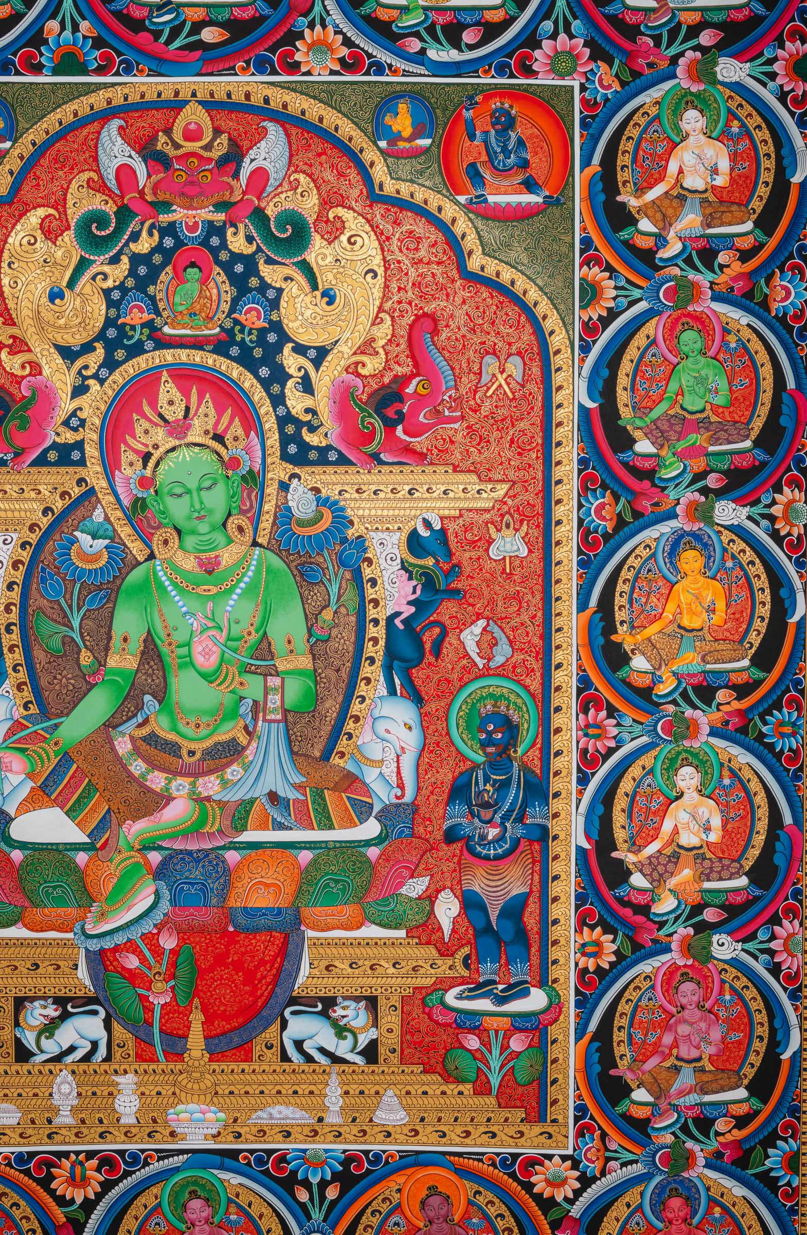 Exclusive Newari Paubha 21 Tara Thangka featuring central Tara, two disciples, and many smaller Green Taras. A traditional Buddhist art piece hand-painted in Nepal.