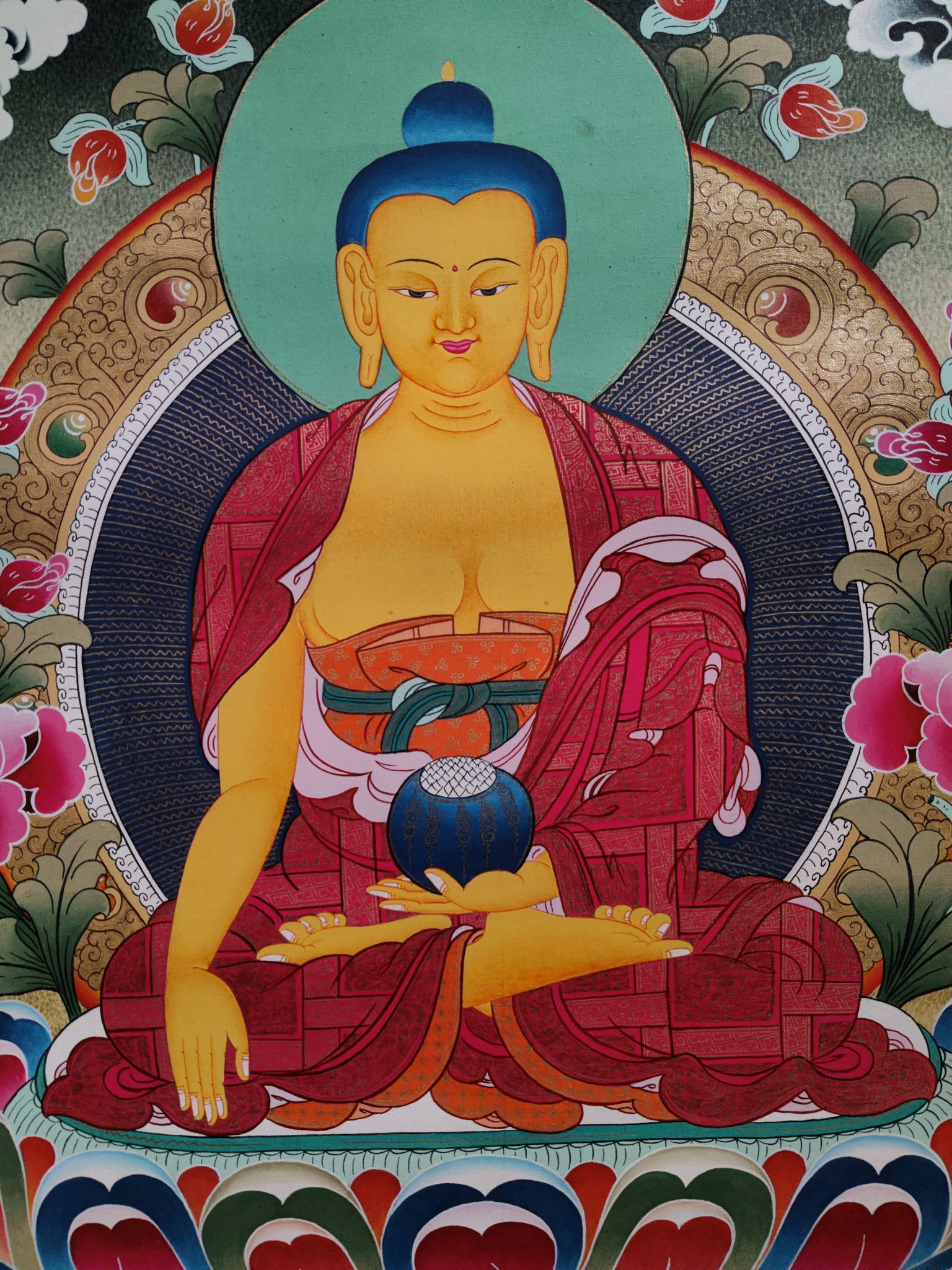 The exquisitely handcrafted Tibetan Thangka Painting displays the beauty of Tibetan artistry and dedication.