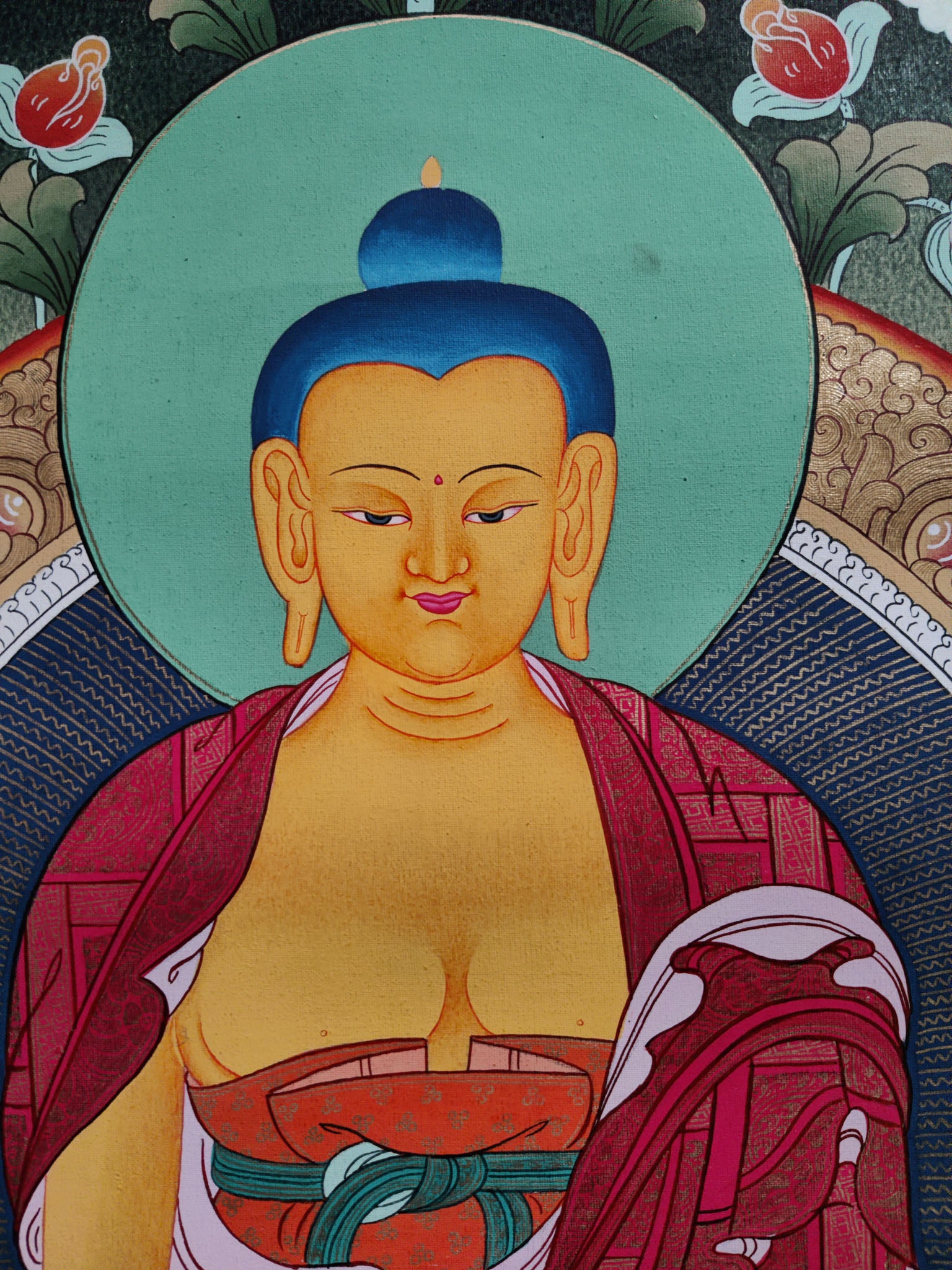 The exquisitely handcrafted Tibetan Thangka Painting displays the beauty of Tibetan artistry and dedication.