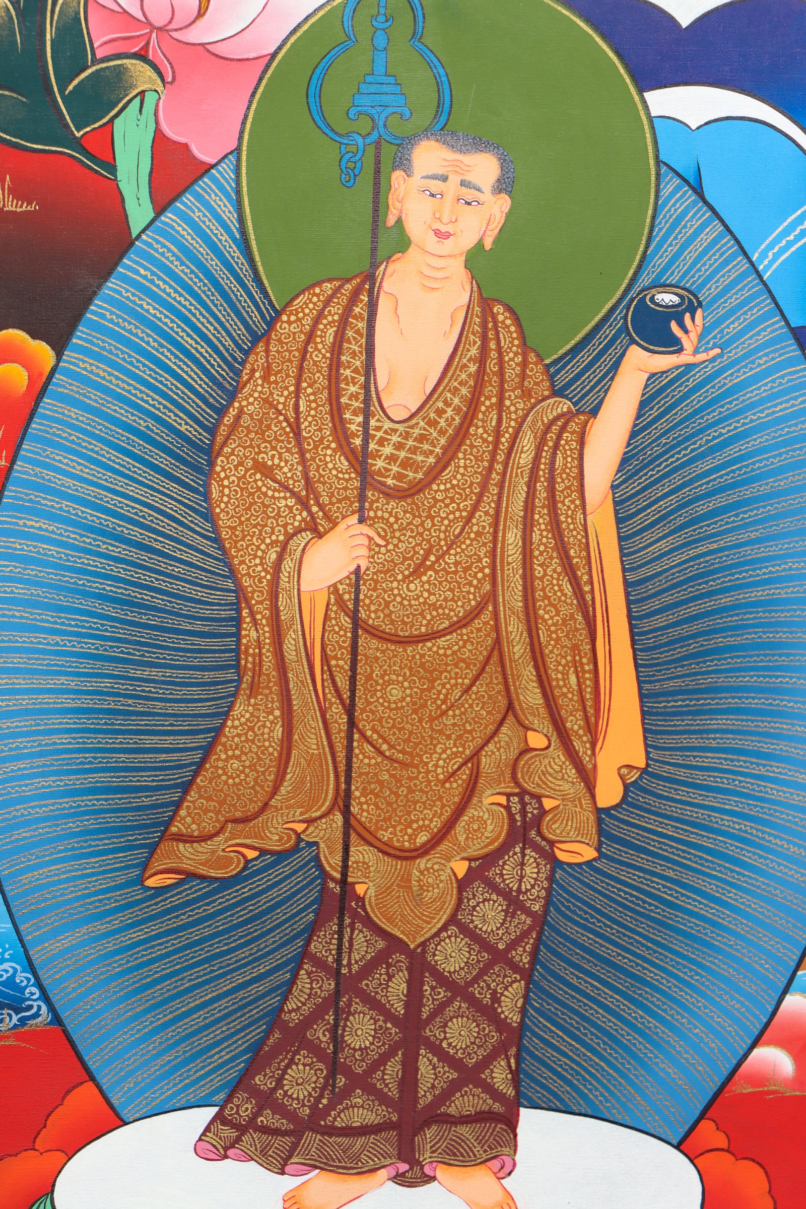 This genuine Tibetan thangka of Shakyamuni Buddha is hand-painted using natural mineral pigments, capturing the essence of the historical Buddha in deep meditation. A sacred symbol in Buddhism, it brings serenity and spiritual depth to any space seeking mindful energy and enlightenment.