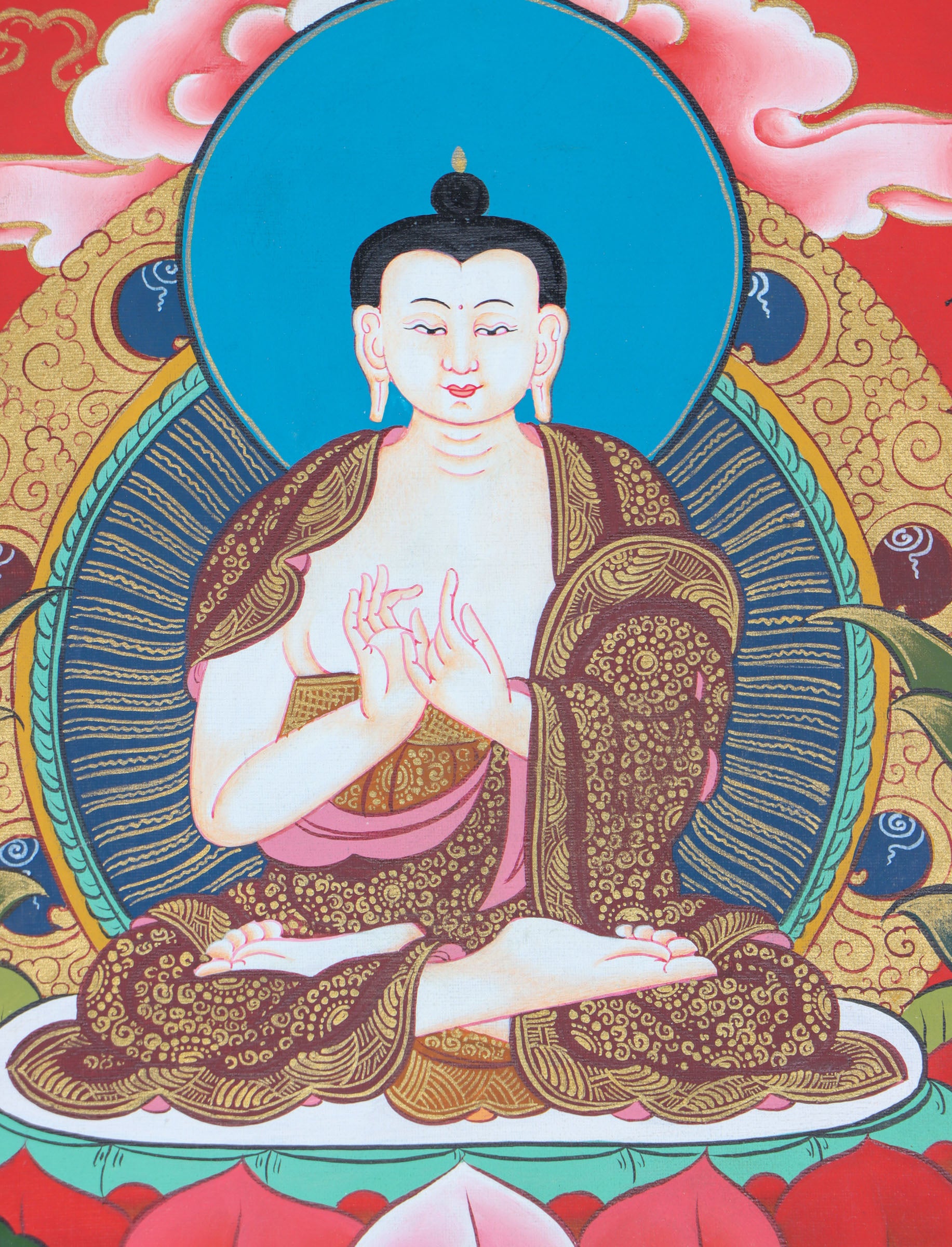 This genuine Tibetan thangka of Shakyamuni Buddha is hand-painted using natural mineral pigments, capturing the essence of the historical Buddha in deep meditation. A sacred symbol in Buddhism, it brings serenity and spiritual depth to any space seeking mindful energy and enlightenment.