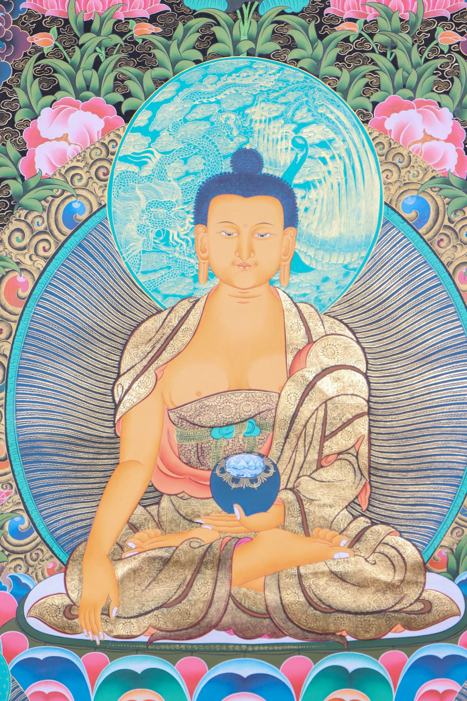 This genuine Tibetan thangka of Shakyamuni Buddha is handcrafted on cotton canvas using mineral pigments, capturing the enlightened essence of the historical Buddha with serene precision. A powerful symbol in Buddhism, it brings spiritual depth and sacred energy to any meditation or devotional space.