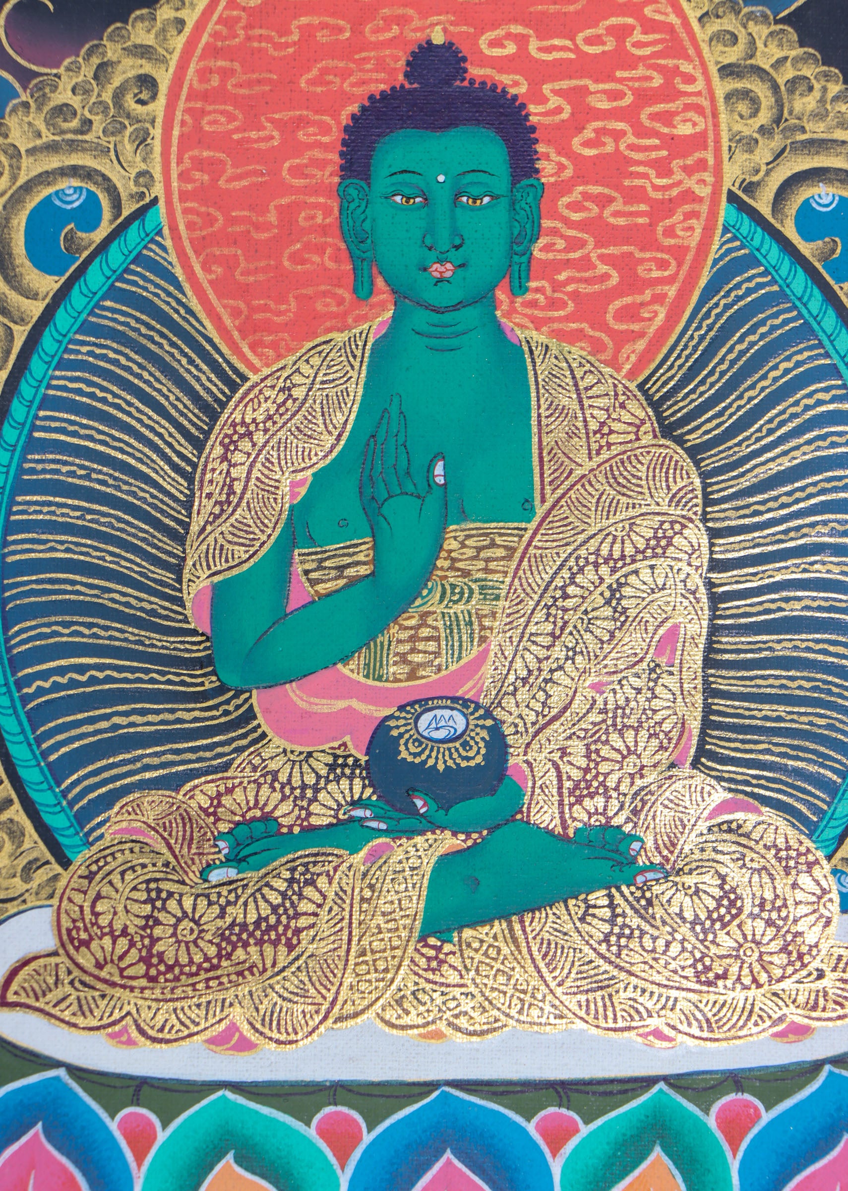 This genuine Tibetan thangka of Shakyamuni Buddha is handcrafted on cotton canvas using mineral pigments, capturing the enlightened essence of the historical Buddha with serene precision. A powerful symbol in Buddhism, it brings spiritual depth and sacred energy to any meditation or devotional space.