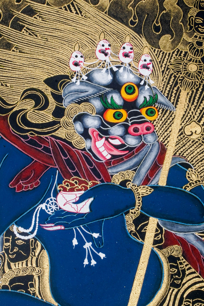 Simhamukha, the Lion-Faced Dakini, is a fierce protector in Tibetan Buddhism, symbolizing wisdom that cuts through ignorance and negativity. This hand-painted Thangka, crafted with natural pigments by skilled artisans, invites clarity, strength, and spiritual protection into your space.