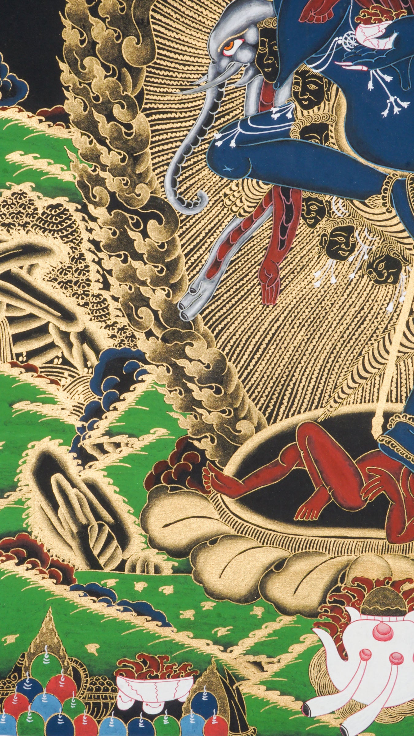 Traditional Tibetan thangka painting depicting Singh Mukhi, the lion-faced protector dakini, shown in a dynamic dancing pose on a lotus base, surrounded by radiant gold flames and intricate symbolic patterns on a dark background.