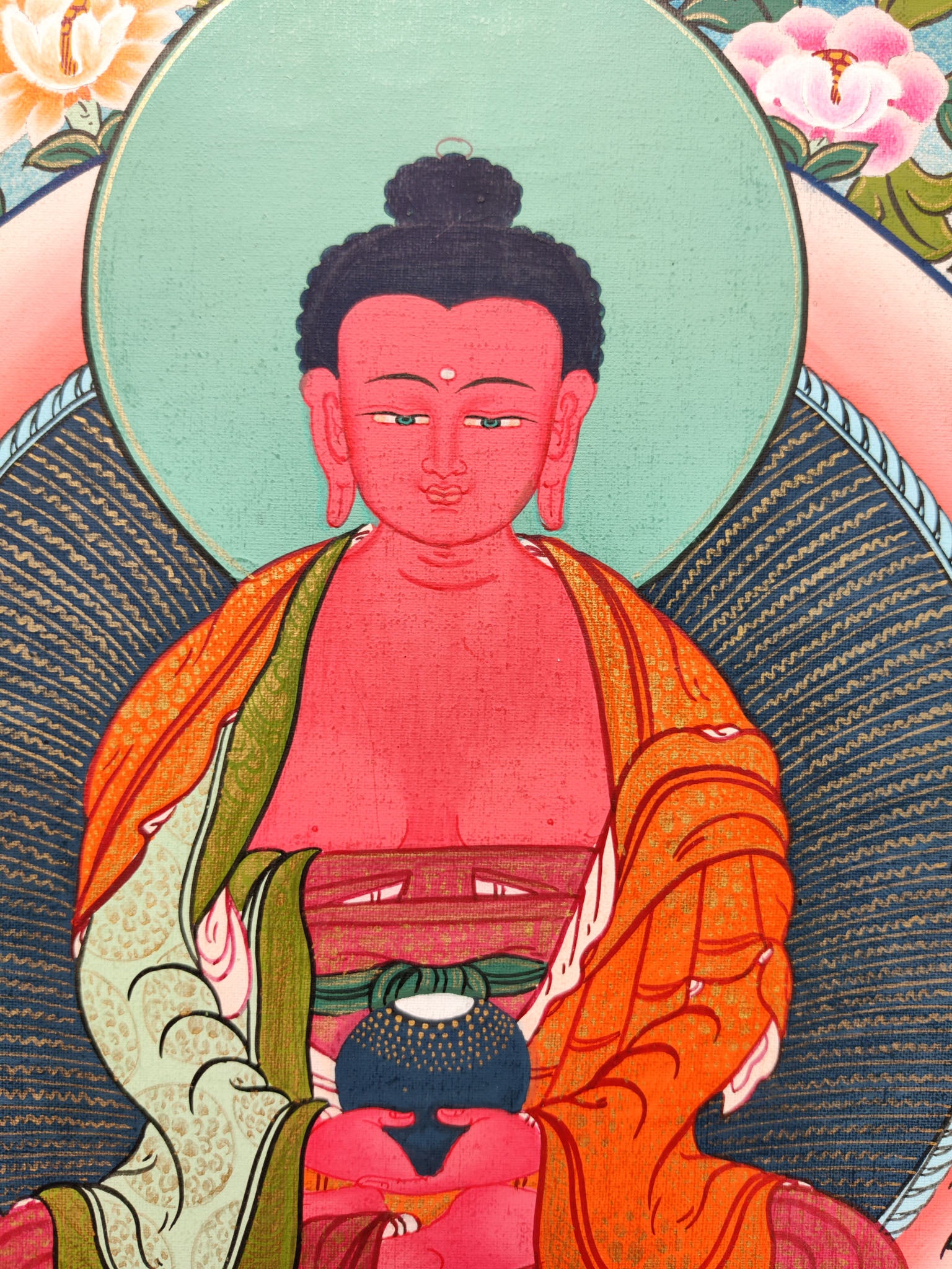 This genuine Tibetan Thangka of Amitabha Buddha, the Buddha of Infinite Light, symbolizes peace, wisdom, and spiritual liberation in Buddhism. Hand-painted with natural pigments, it serves as a powerful tool for meditation and devotion in any sacred space.