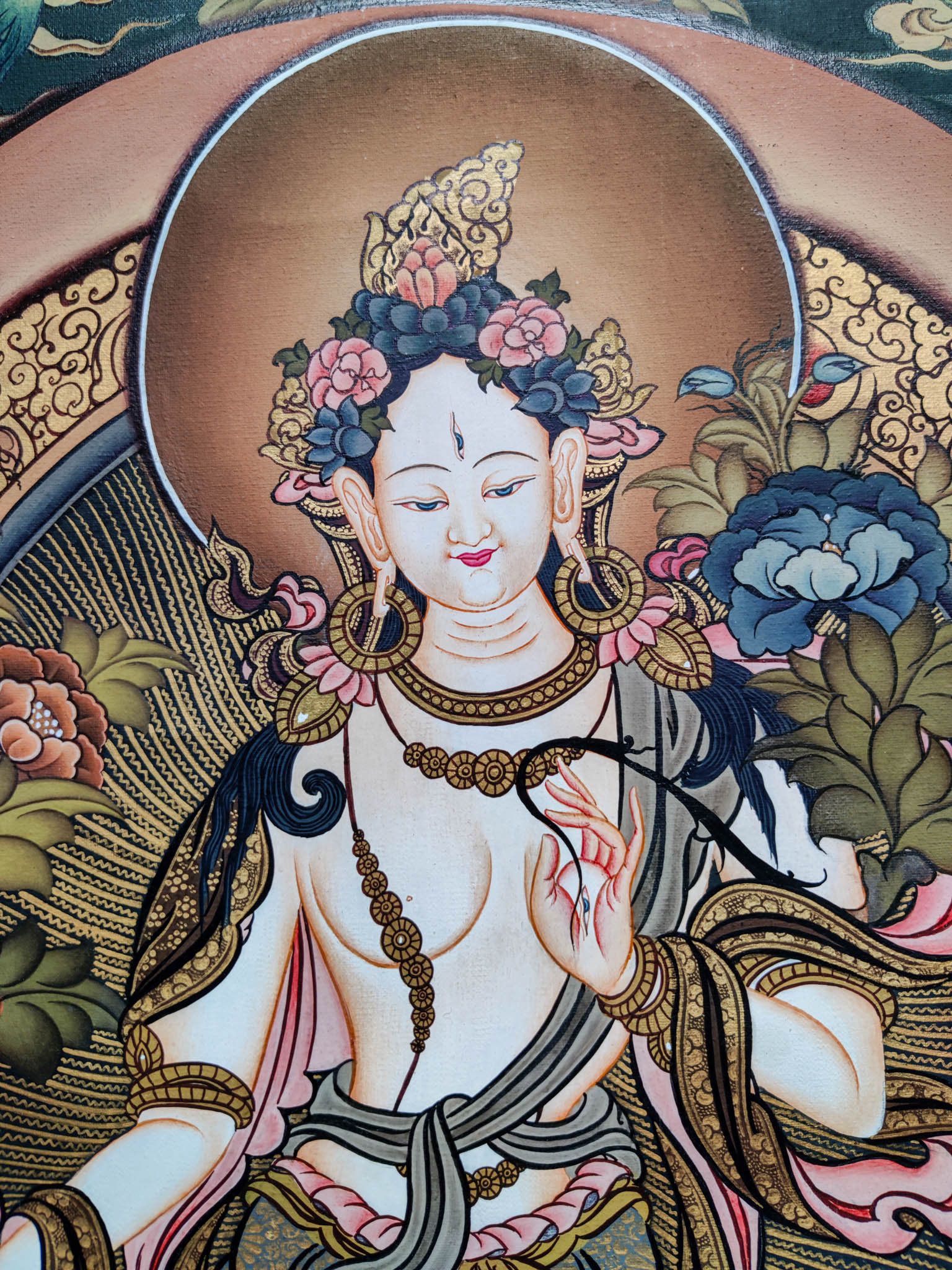 This White Tara Thangka Painting is ideal for establishing serenity and enlightenment in your home or other sacred space.